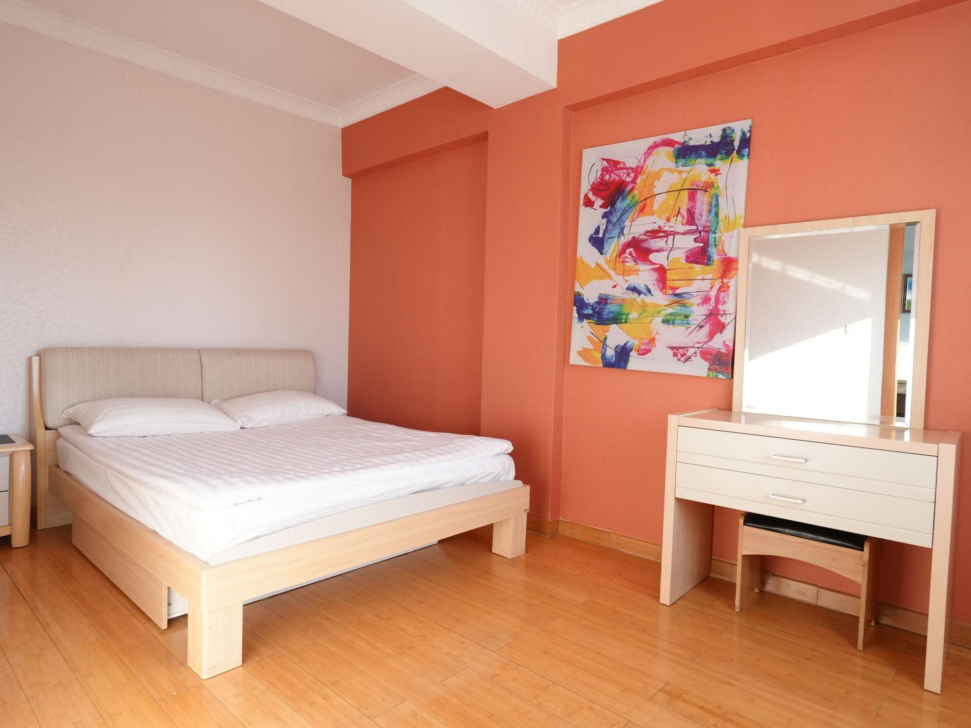Habitación Tanan Center Serviced Apartments