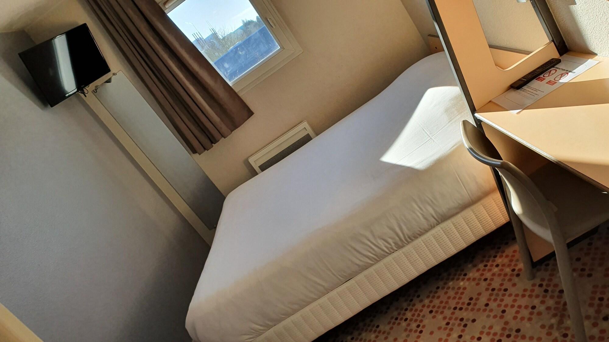 Habitación Welcomotel Coignières