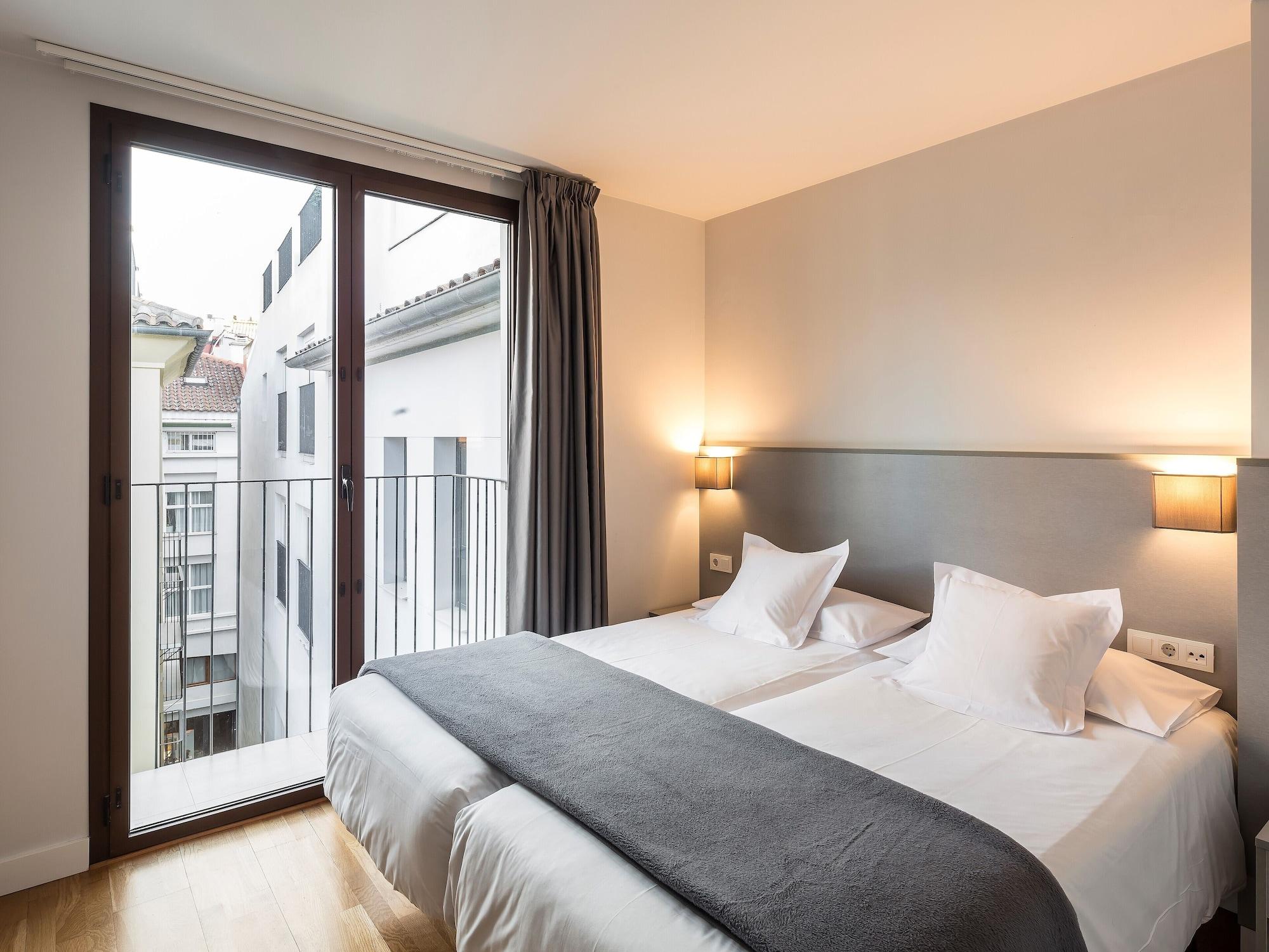 Habitación Mon Suites Catedral