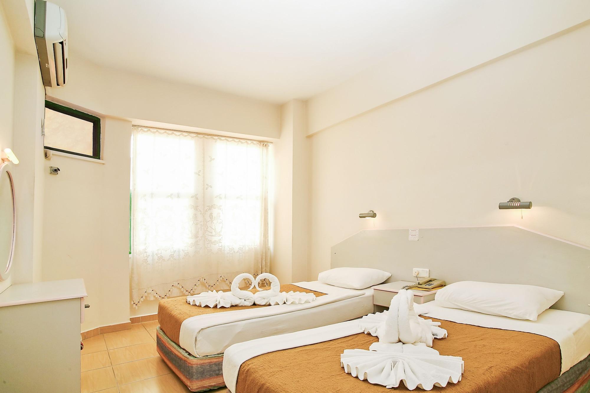 Habitación Magi Apart Hotel