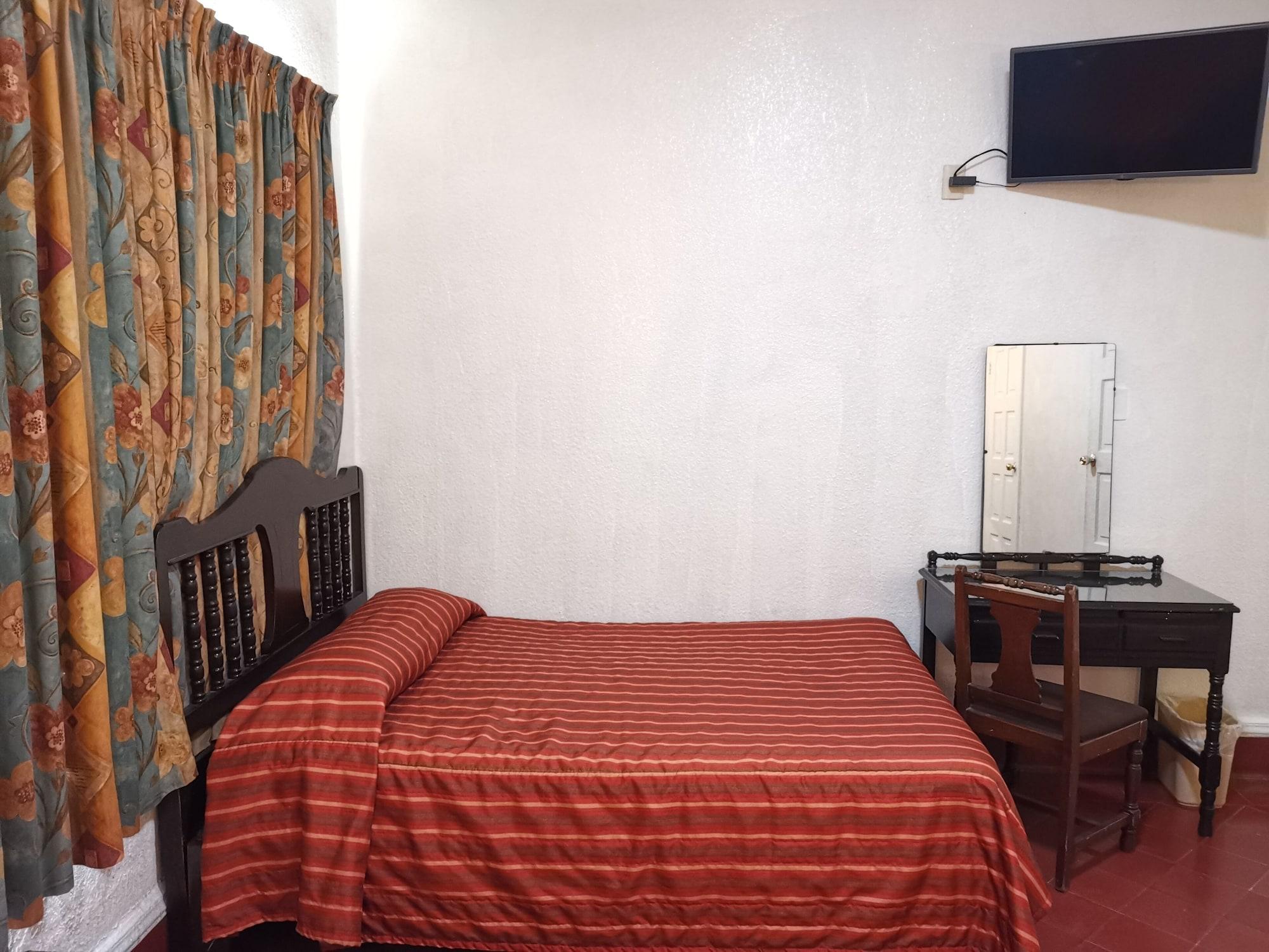 Habitación Hotel 5a Avenida