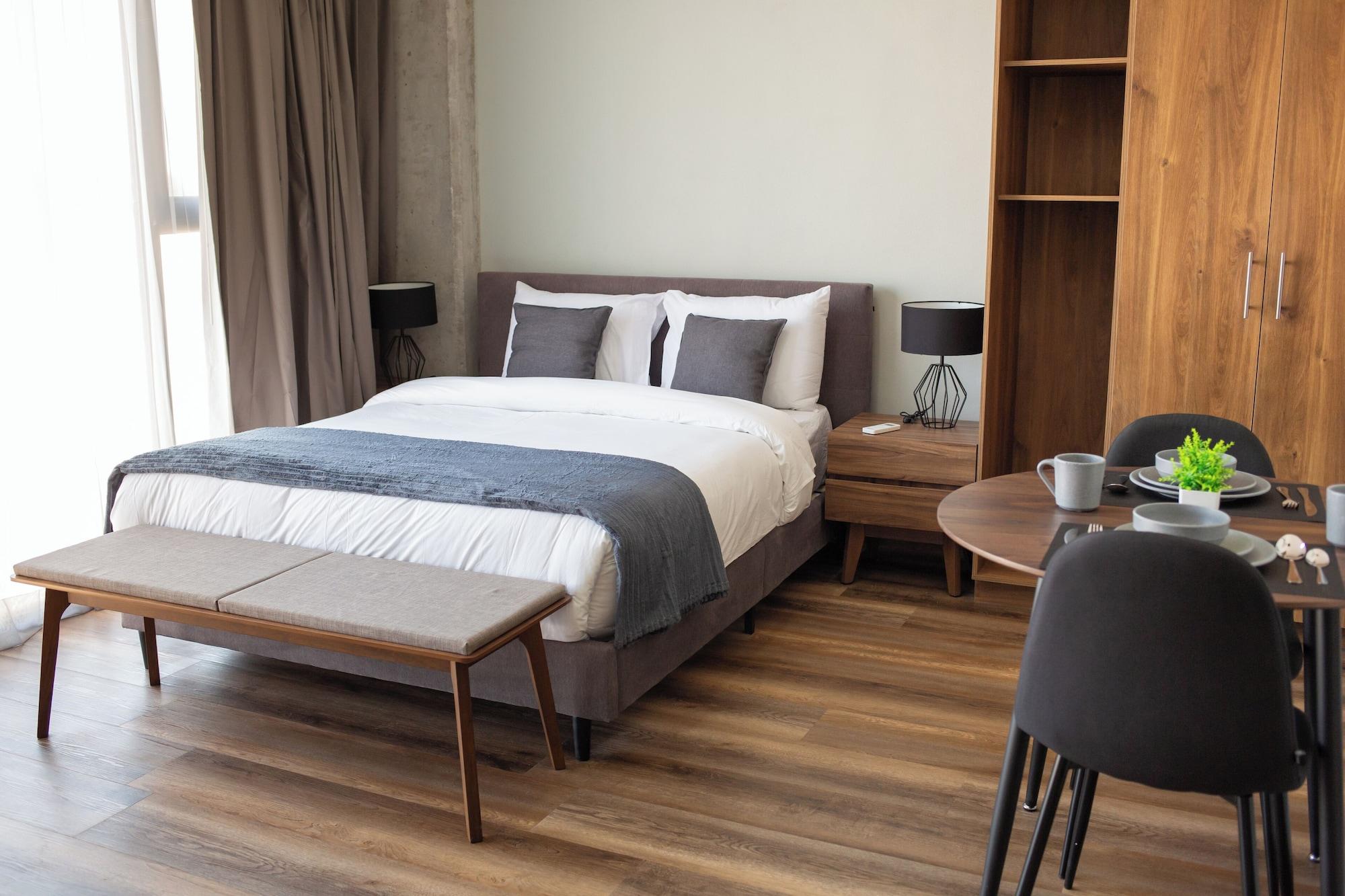 Quarto Suites Del Carmen