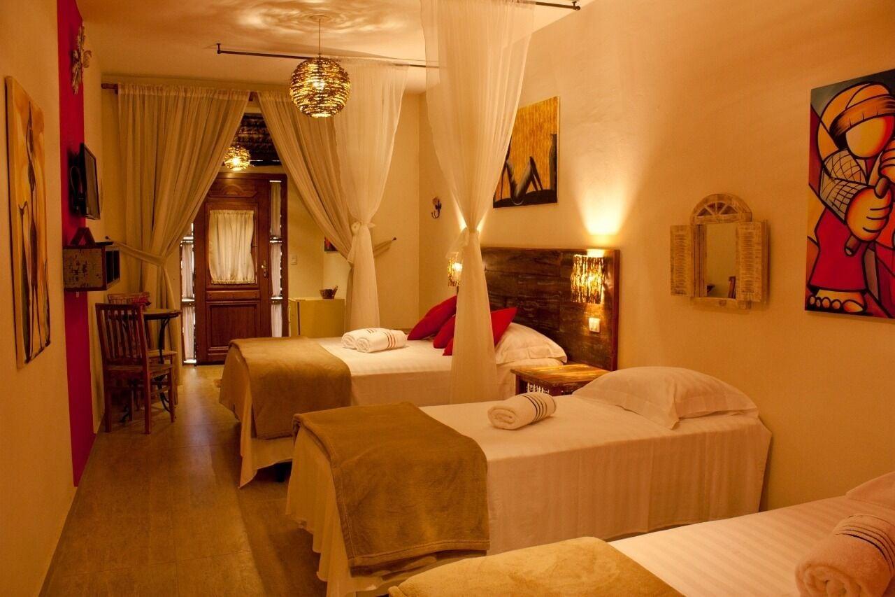 Quarto Pousada de Charme Emirados