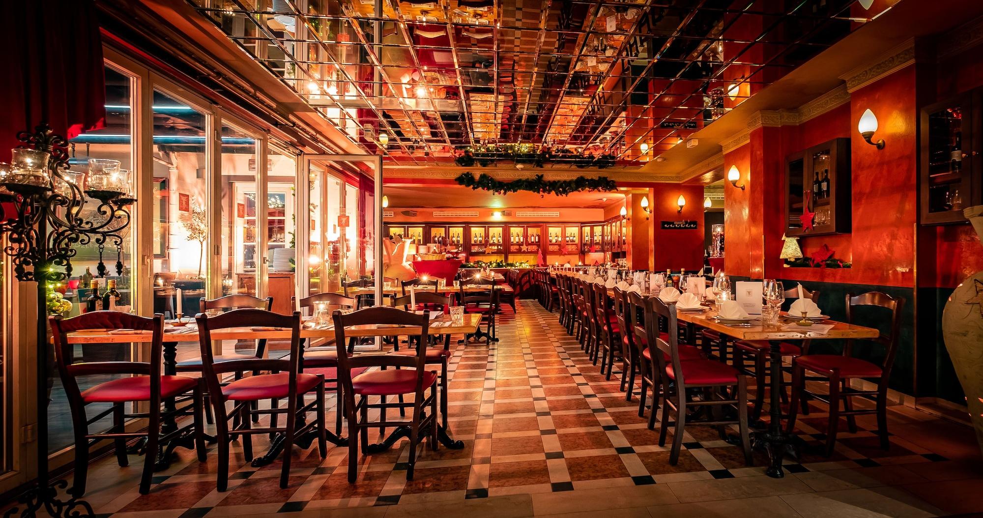 Restaurant XII Apostel Hotel Albergo