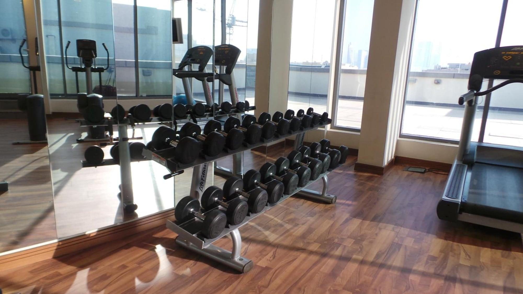 Gimnasio Xclusive Maples Hotel Apartment