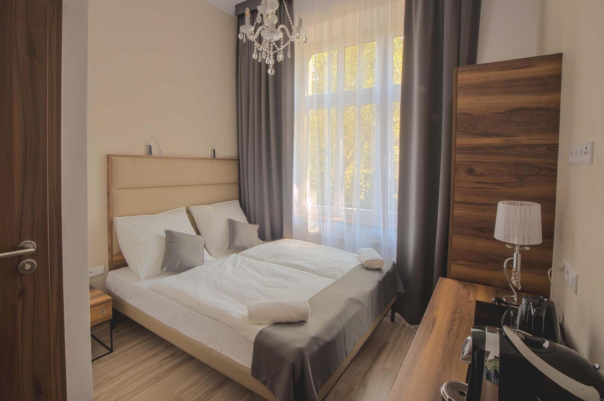 Habitación Pergamin Royal Apartments