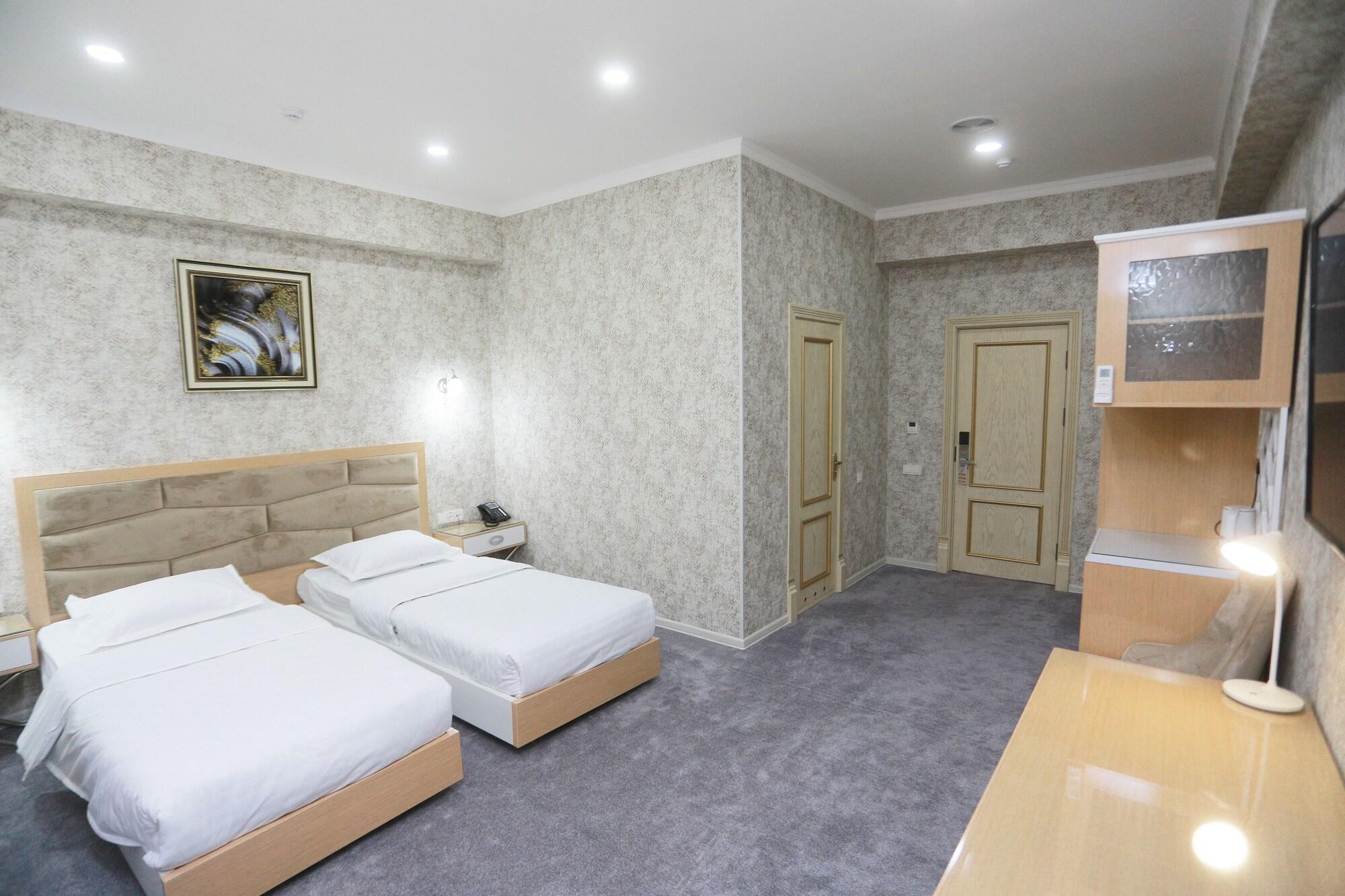 Habitación Reikartz Amirum Tashkent