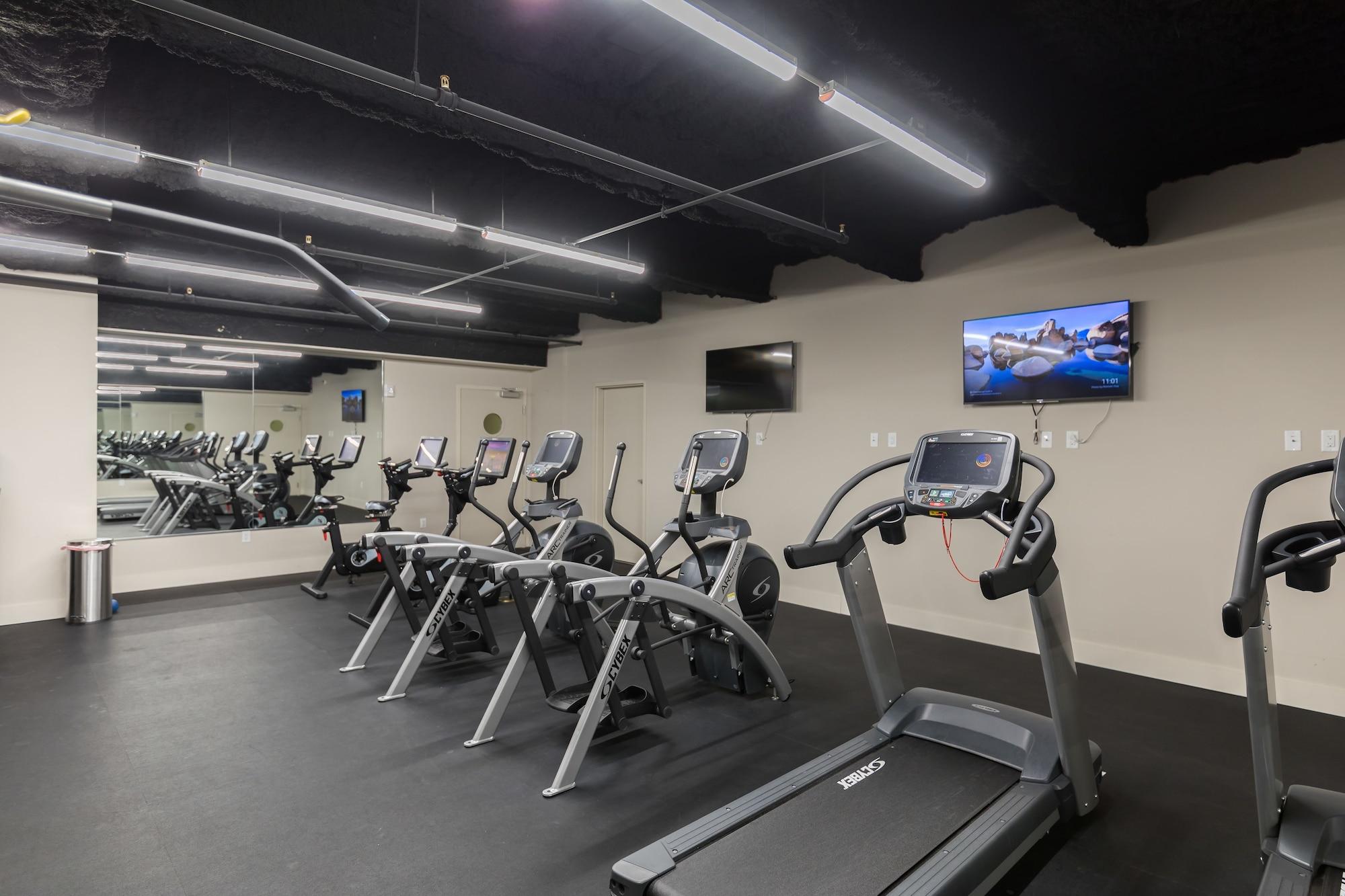 Gimnasio Modern Condos in California Building by Hosteeva