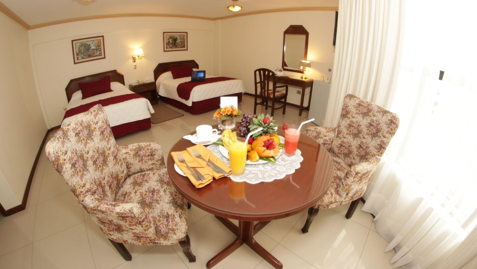 Habitación House Inn Apart Hotel