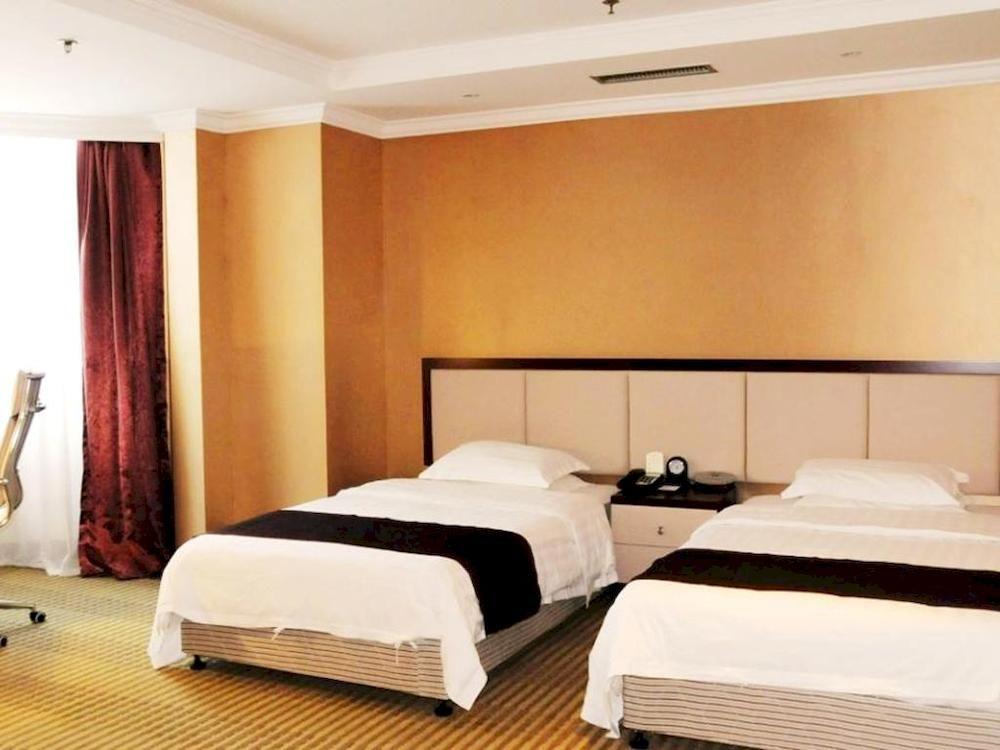 Habitación Xinmao Tiancai Hotel