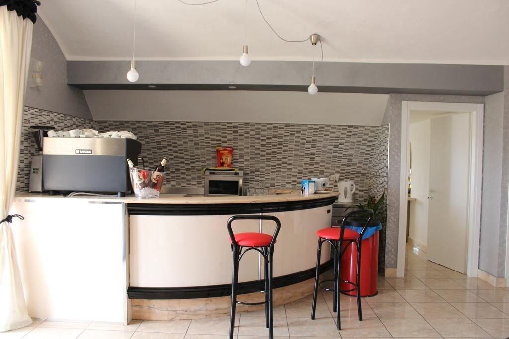 Bar/Salón Il Postiglione