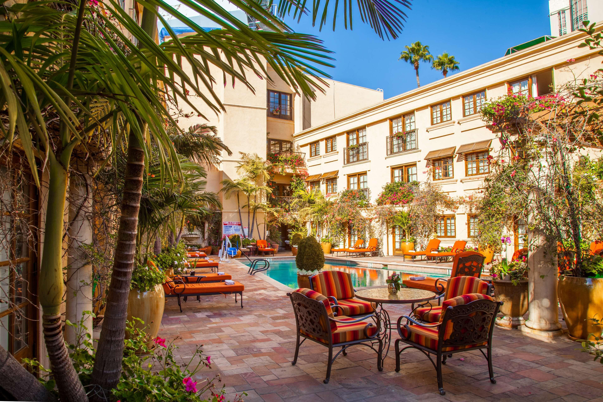 Vista Piscina Best Western Plus Sunset Plaza Hotel