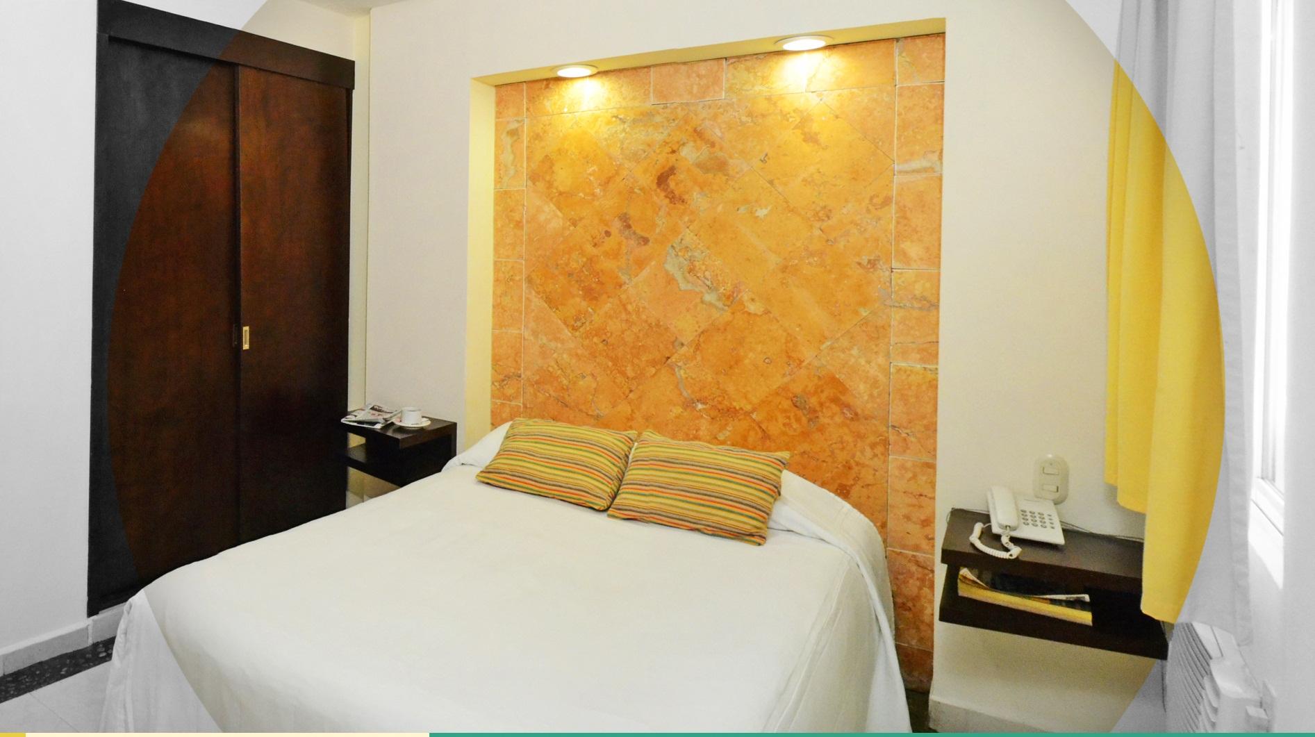 Habitación Angeles Suites & Hotel