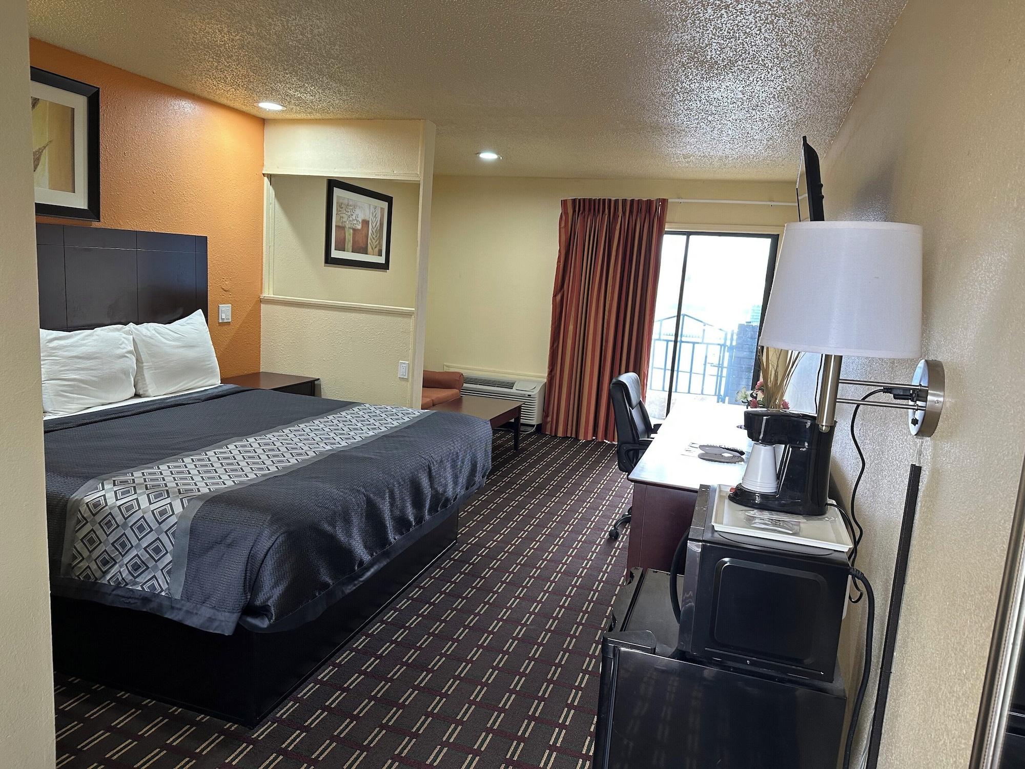 Habitación Executive Inn & Suites