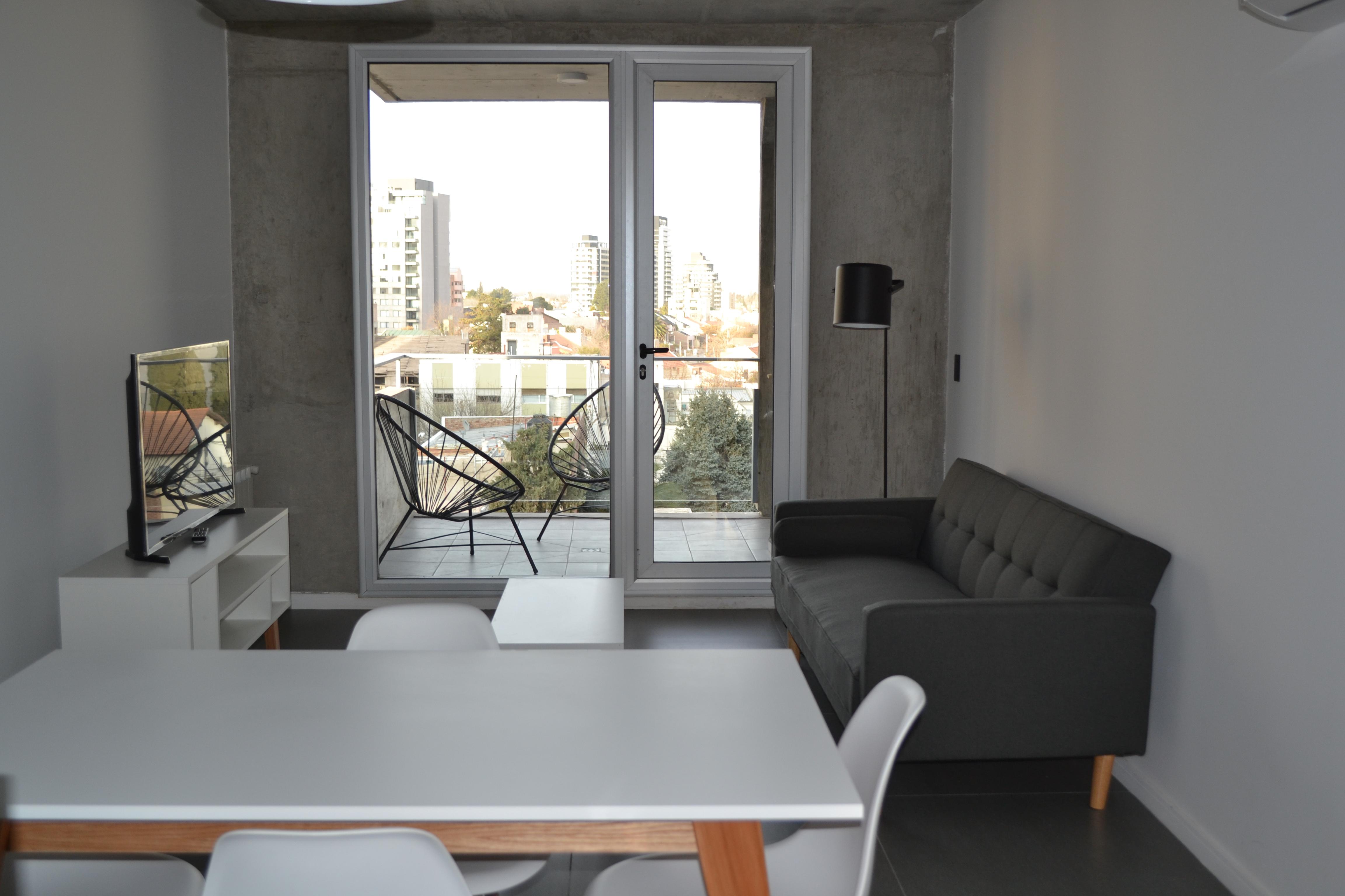 Zona de estar Loi Flats Neuquén Edificio Tucumán