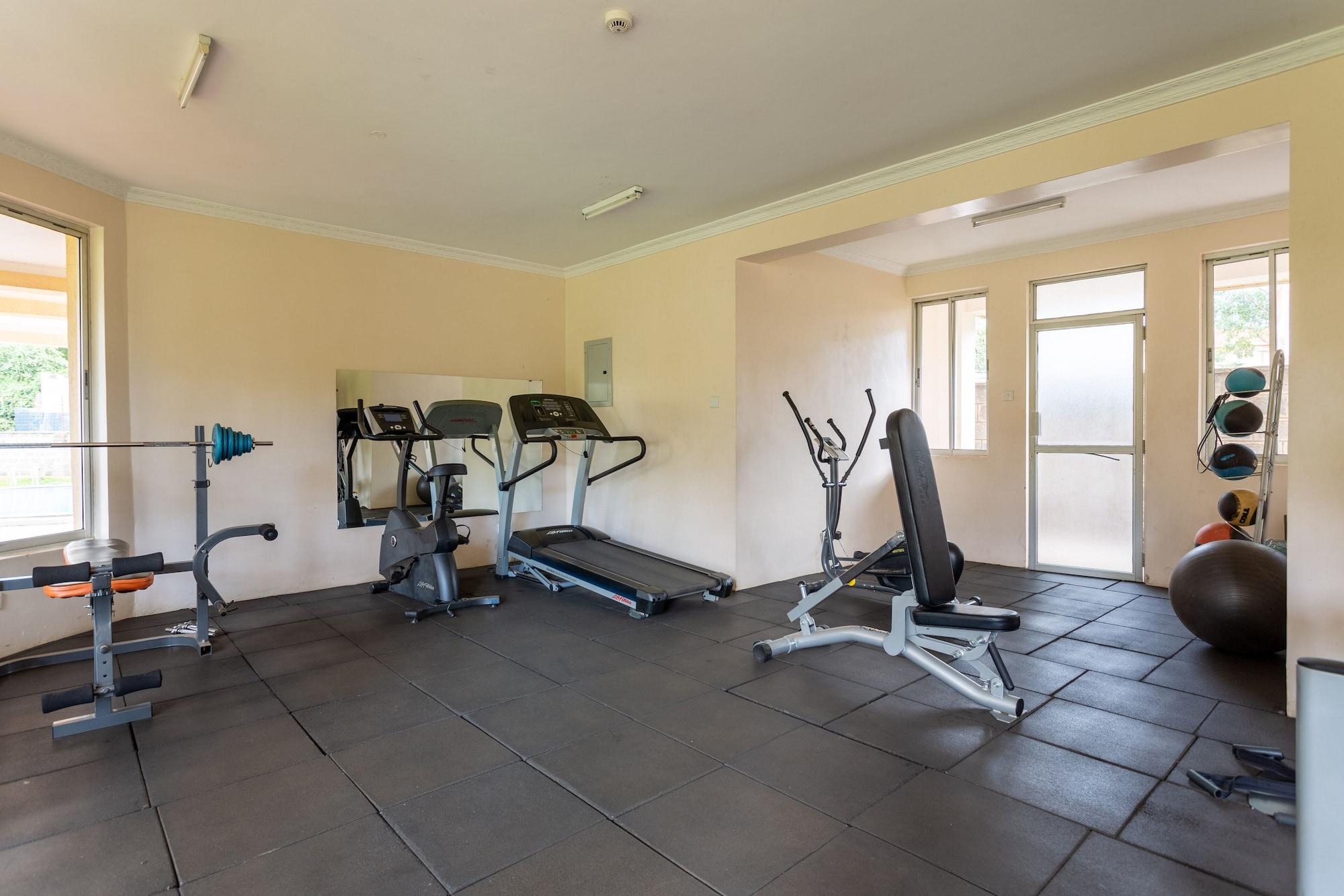 Gimnasio Longview Suites