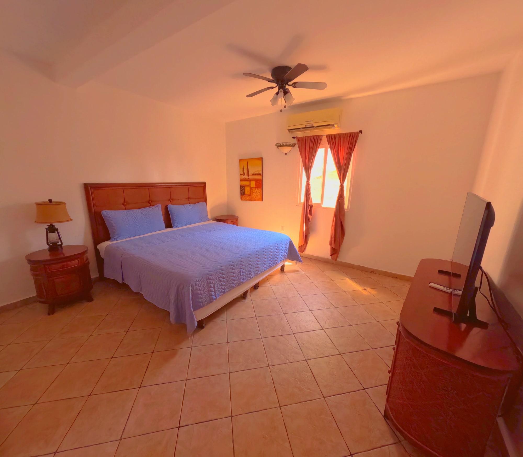 Habitación West Bay Colonial
