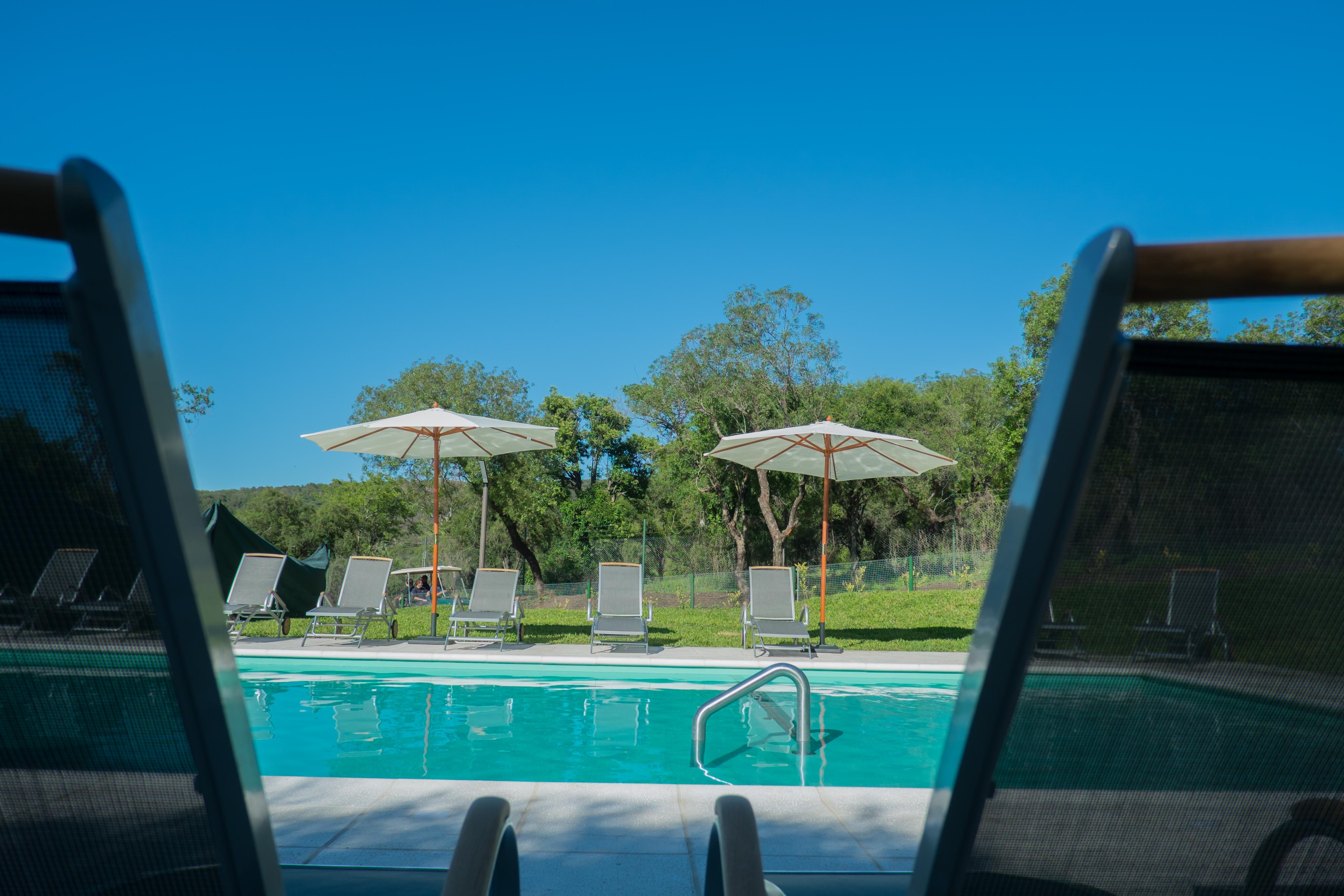 Vista Piscina Orfeo Suites Hotel Sierras Chicas