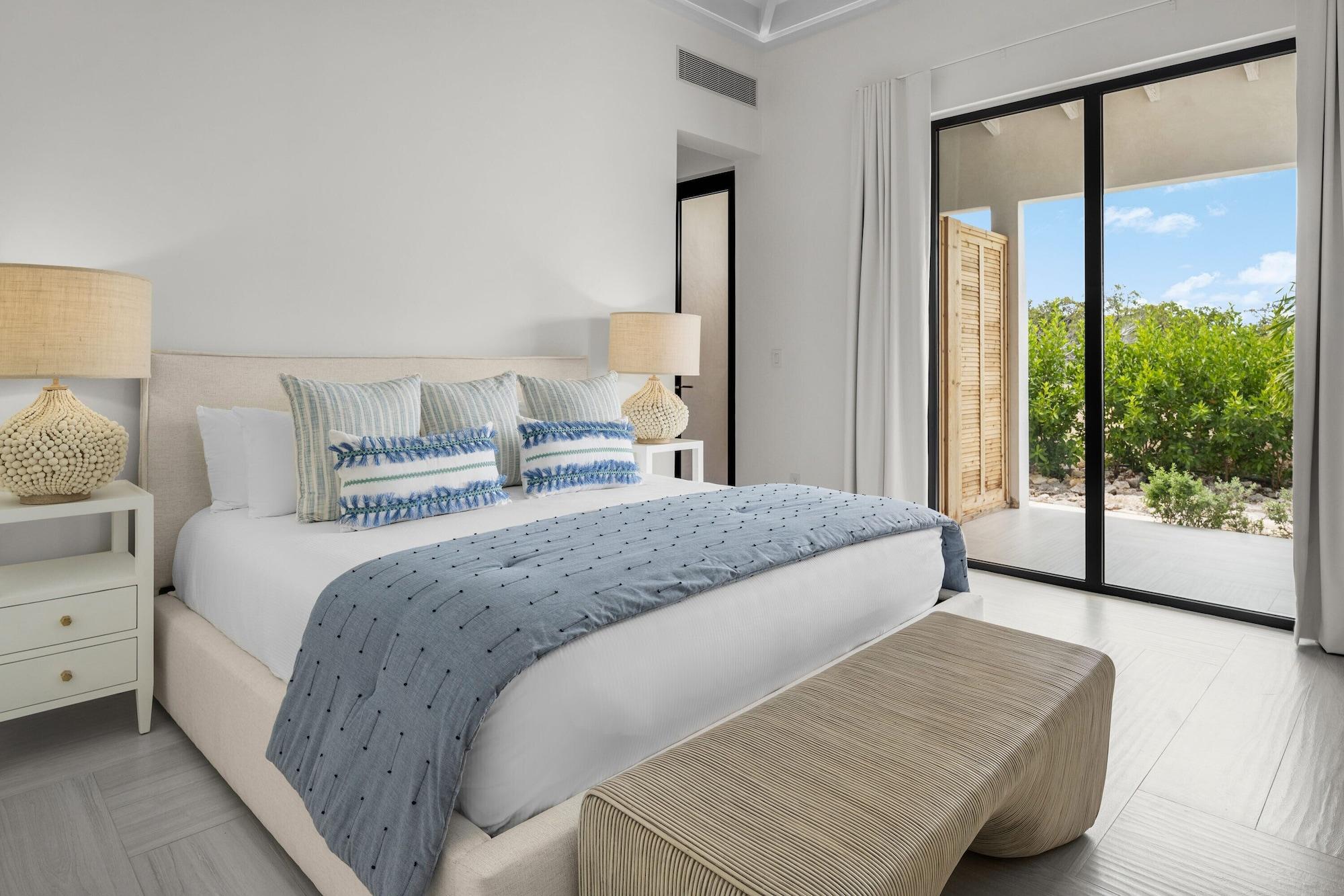 Habitación Ambergris Cay Private Island – All Inclusive – PLS Island Hopper Flight Included