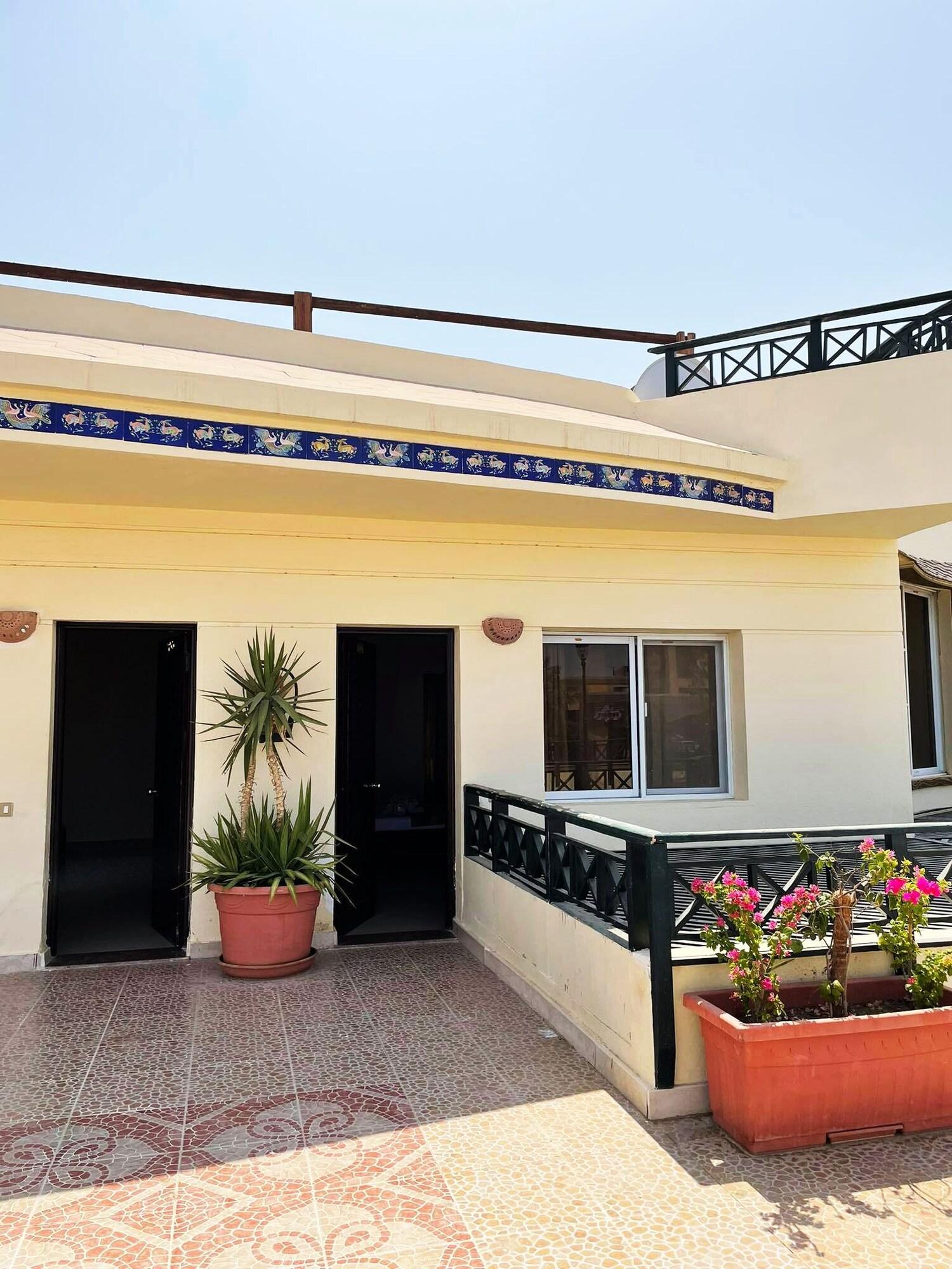 Habitación Naama Inn