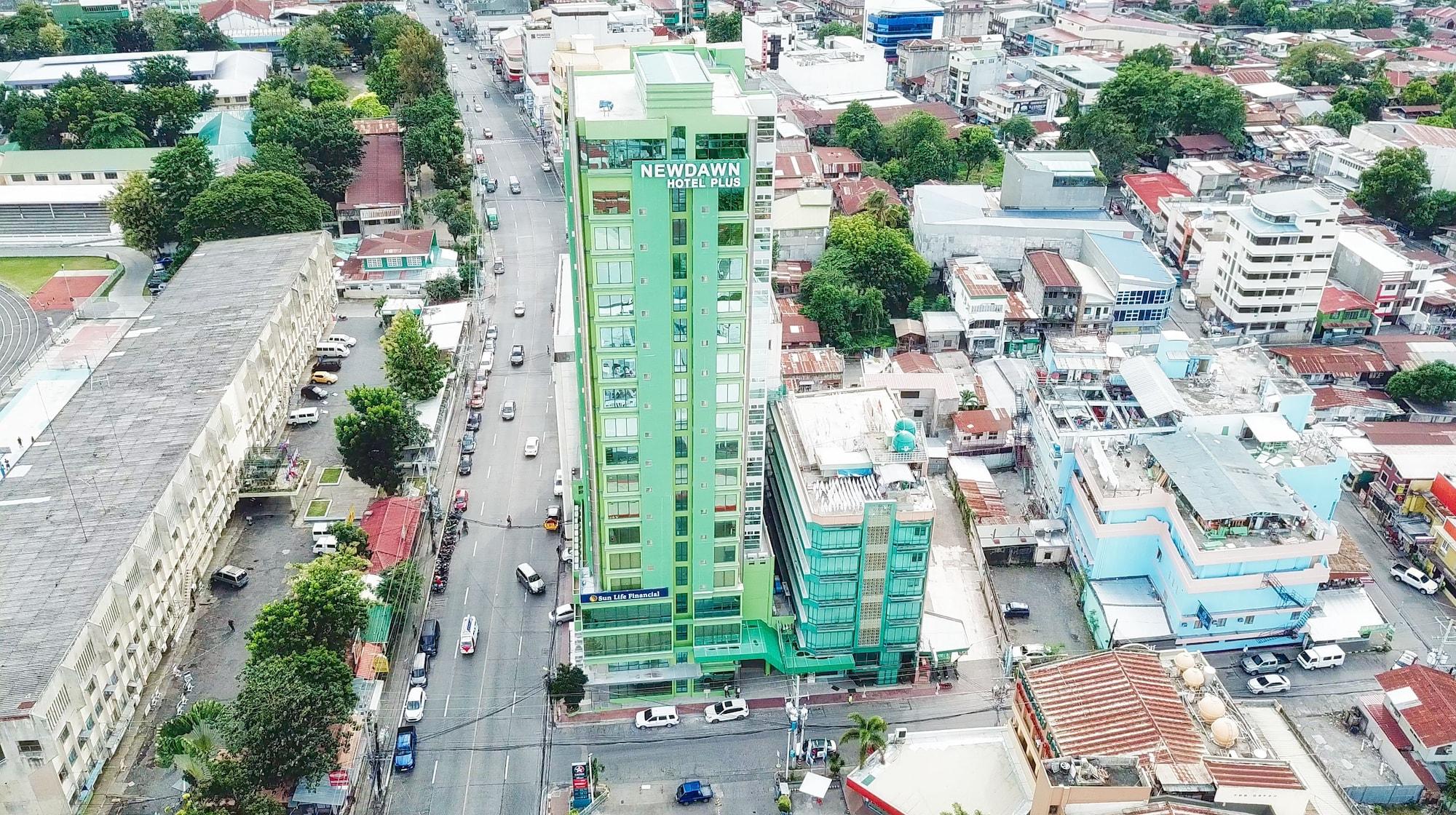 Vista Exterior New Dawn Hotel Plus