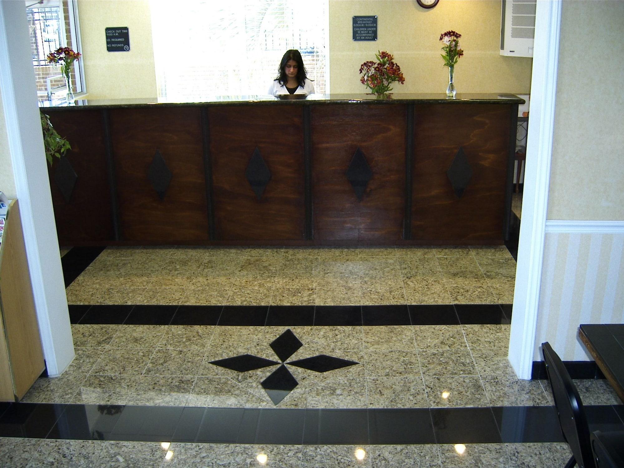 Vista Lobby Travelers Inn & Suites