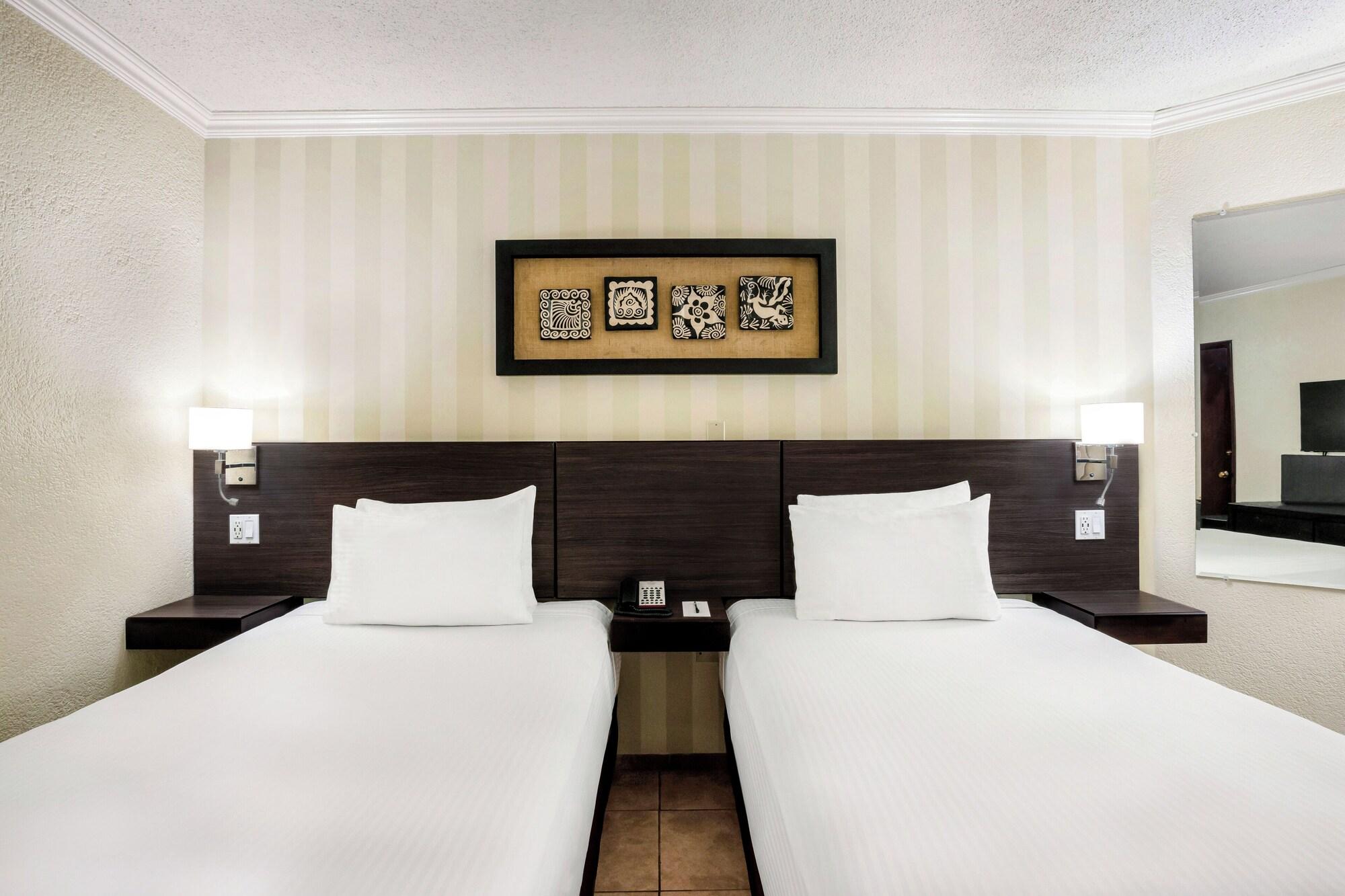 Habitación Copantl Hotel & Convention Center