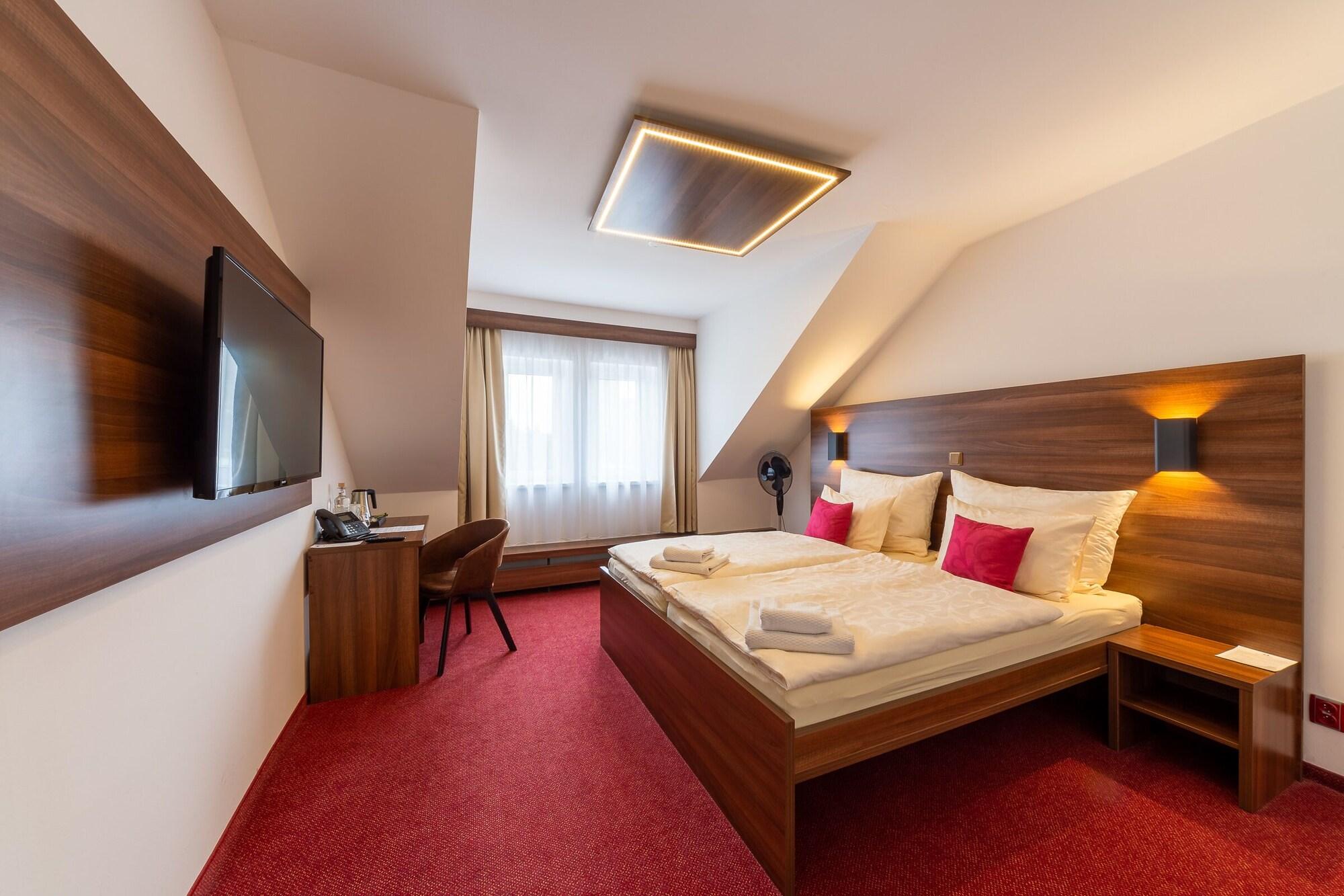 Habitación Bohemia Inn Hotel