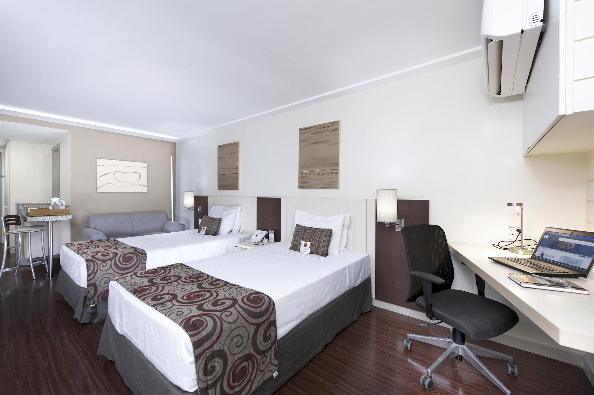Habitación Comfort Suites Macae