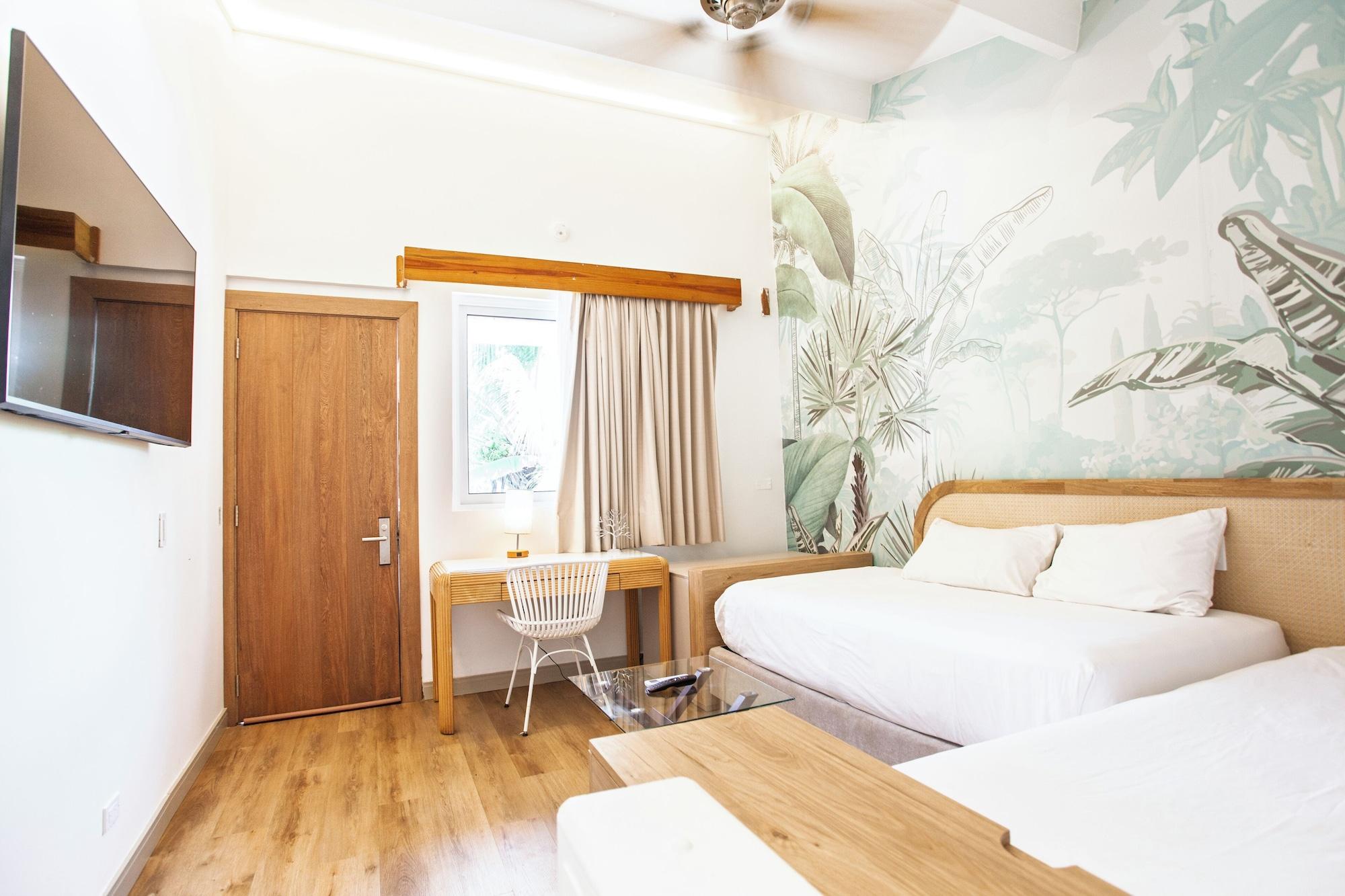Habitación Cocoplum Beach Hotel