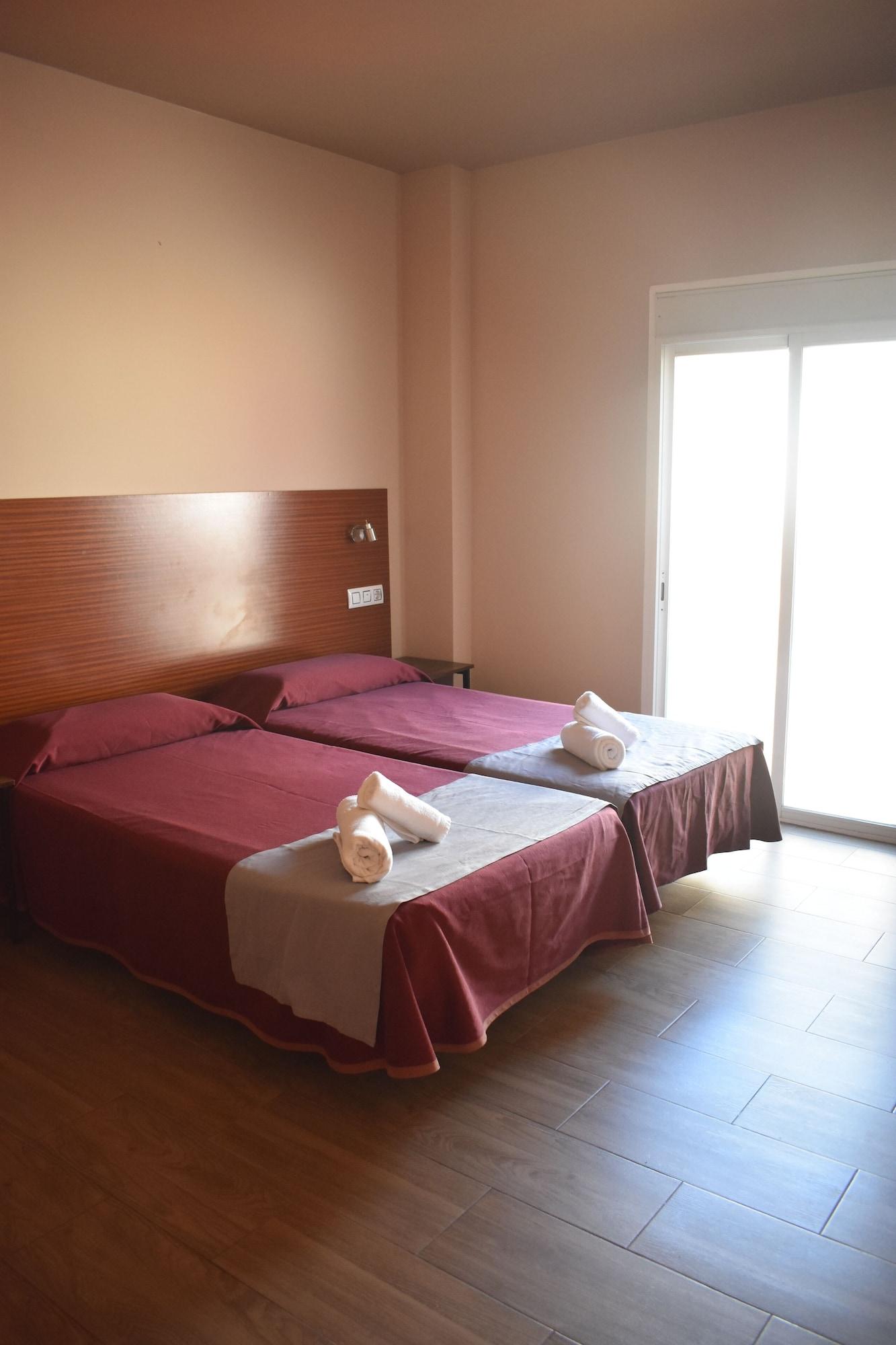 Habitación Hostal Alamare
