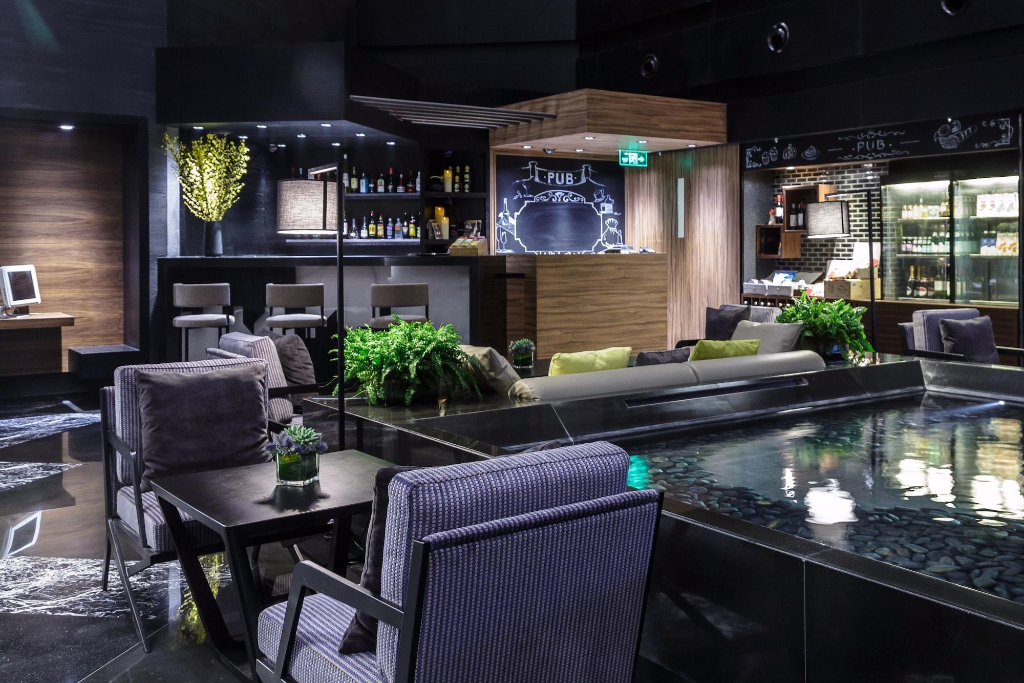 Bar/Salón Jingguang Center Apartment