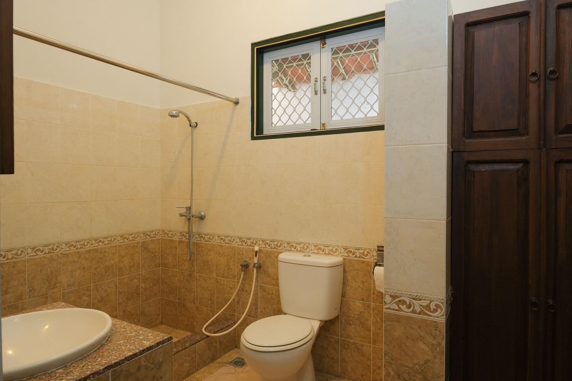 Equipamiento de Habitación OYO 244 Griya Cemara Homestay