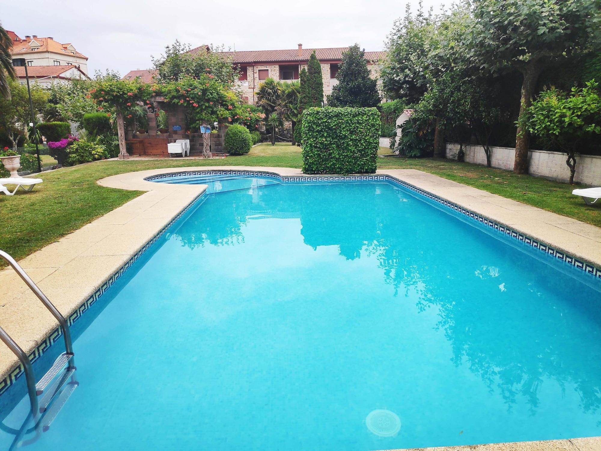 Vista Piscina Apartamentos Revolta Sanxenxo 3000