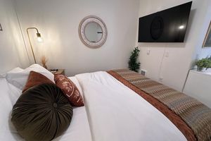 Alquiler Vacacional - Cozy apartment with Rooftop views, home workspace and close to Hospitals!