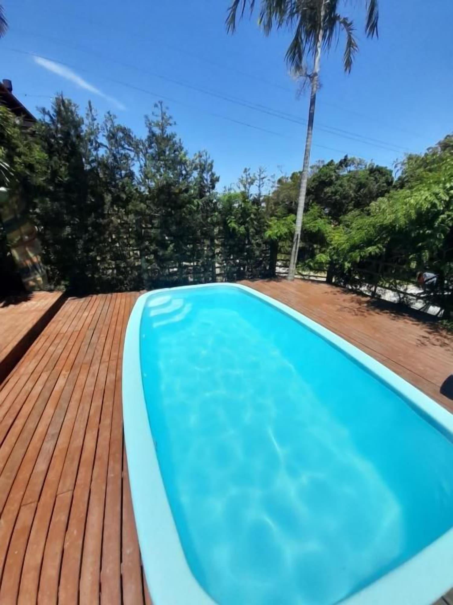 Vista da piscina Pousada Baia Rosa
