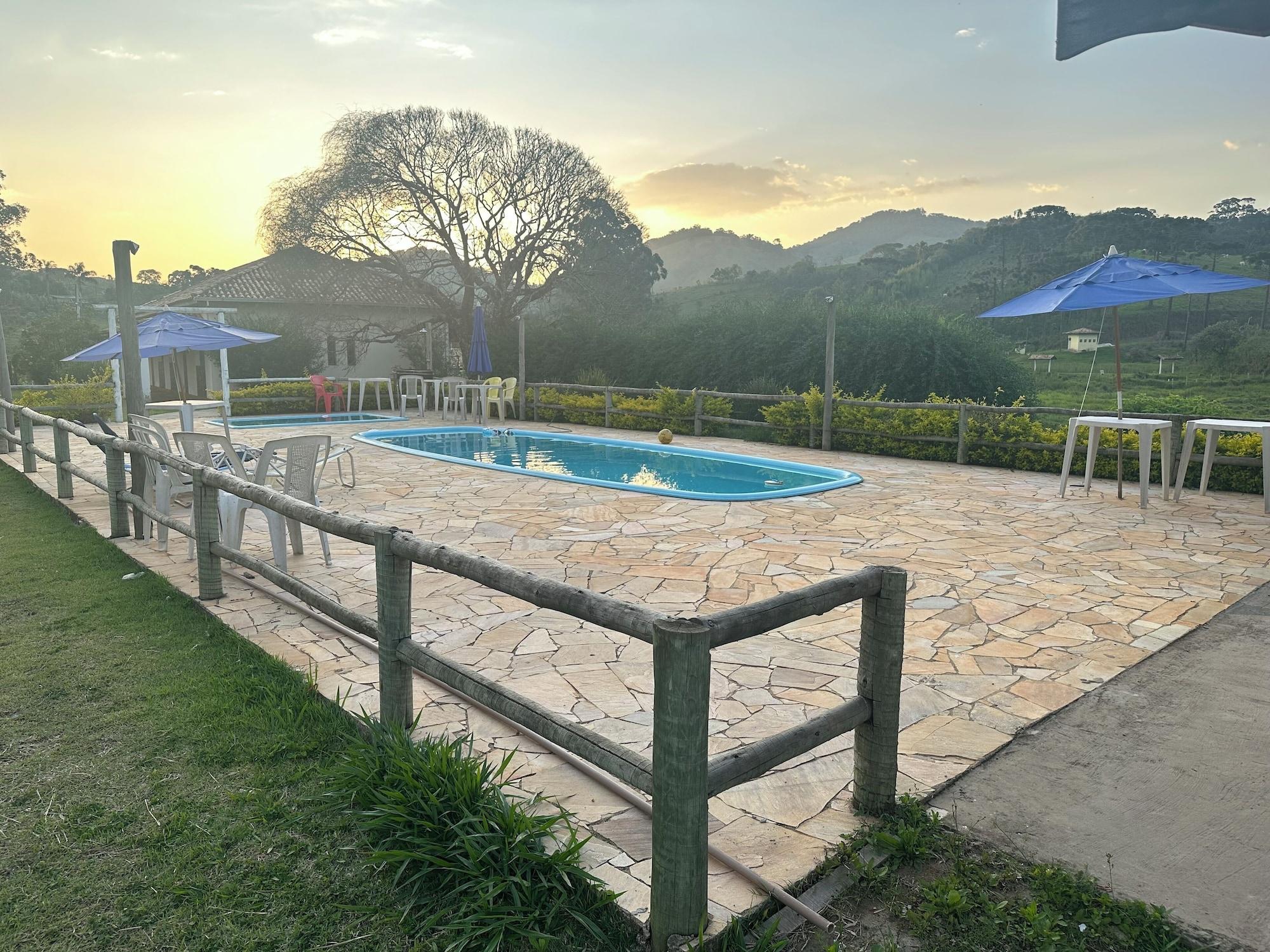 Vista Piscina POUSADA VISON E RESTAURANTE ALQUMIA