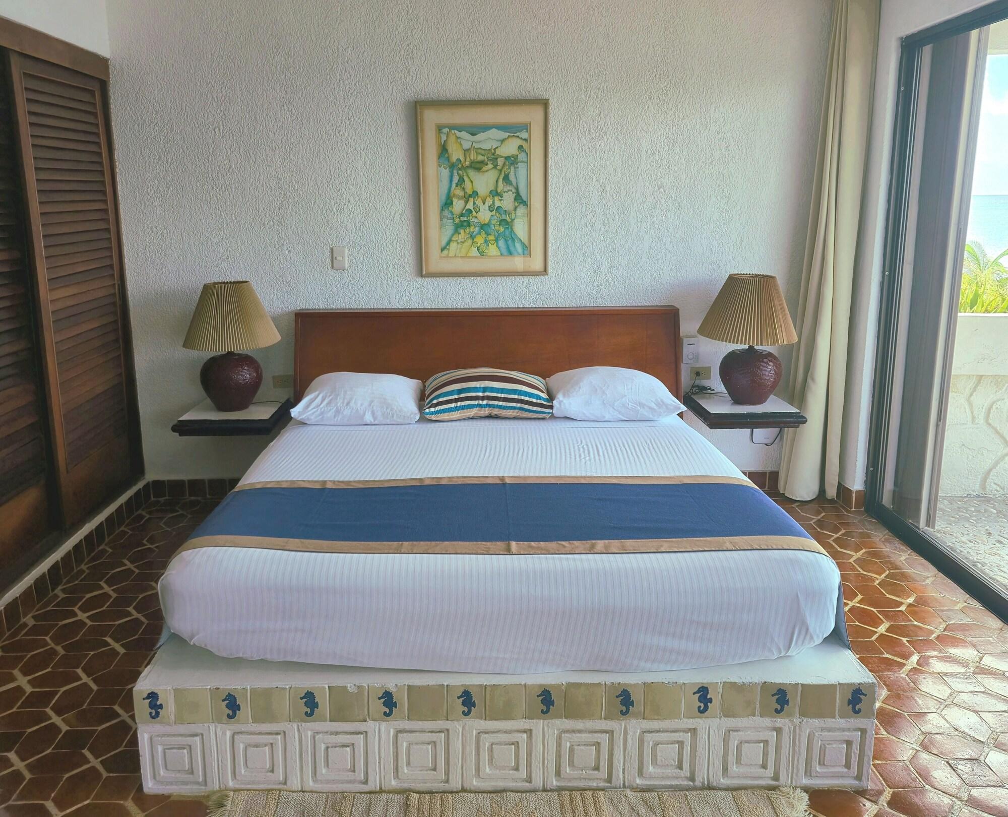 Habitación Condumel Condominiums