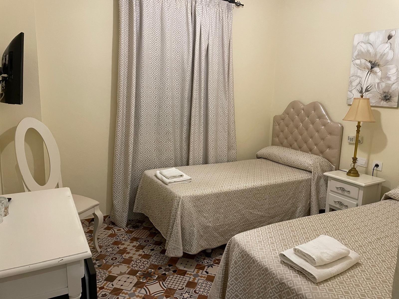Habitación Hostal Flor de Lis - Lojo