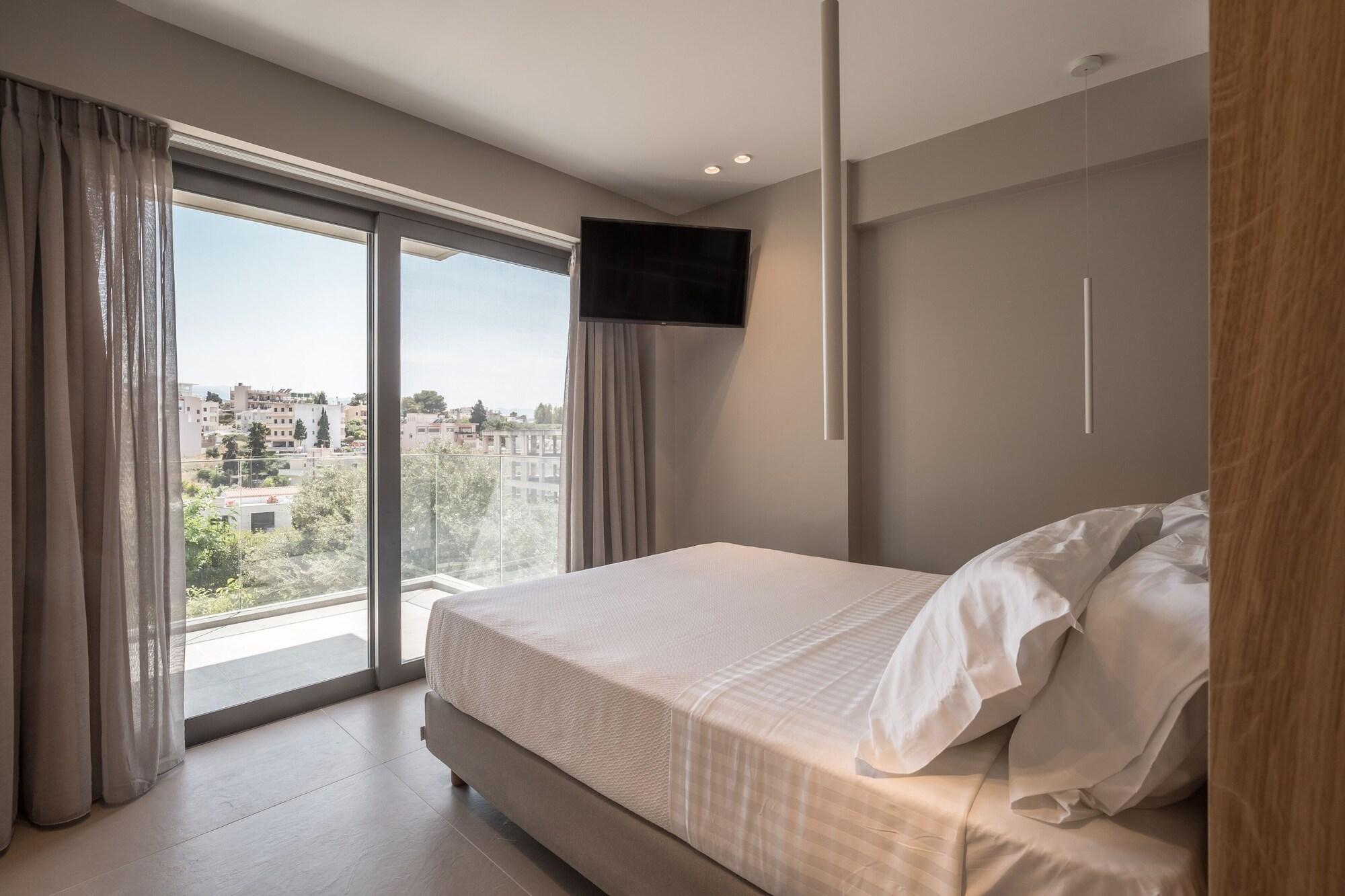 Habitación Noemie Luxury Suites