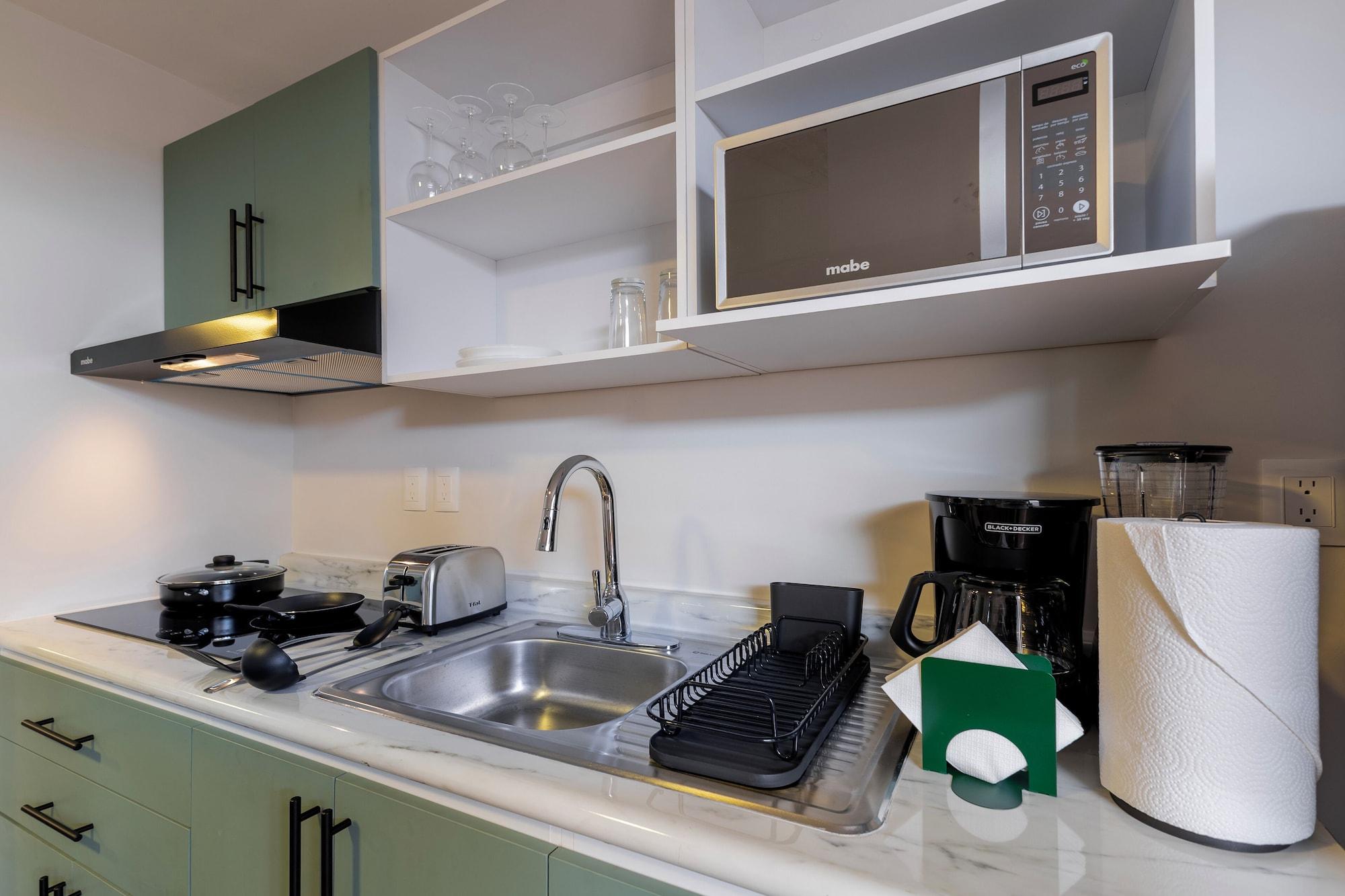 Equipamiento de Habitación Magis Downtown Juarez by Capitalia