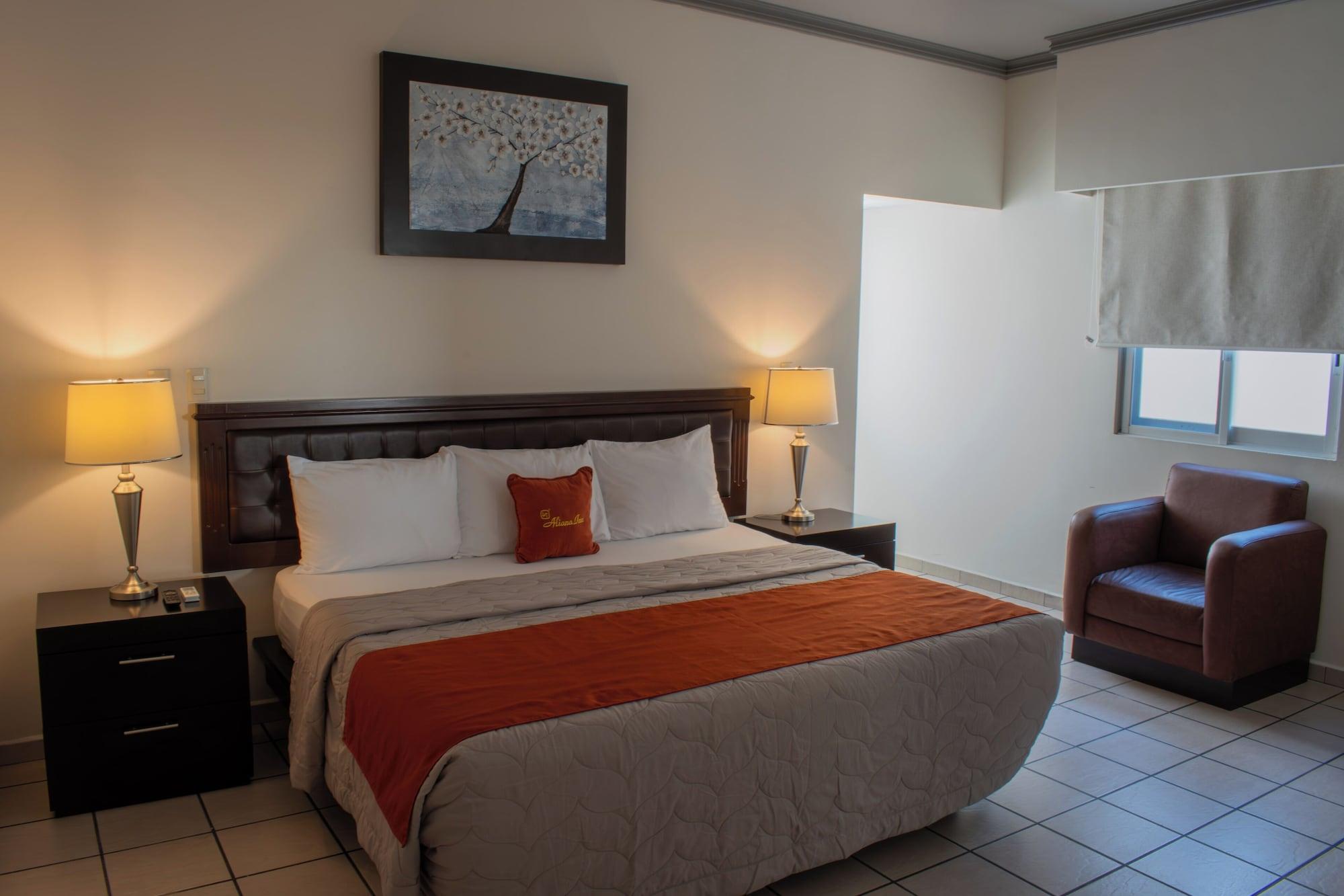 Habitación Hotel & Suites Aliana