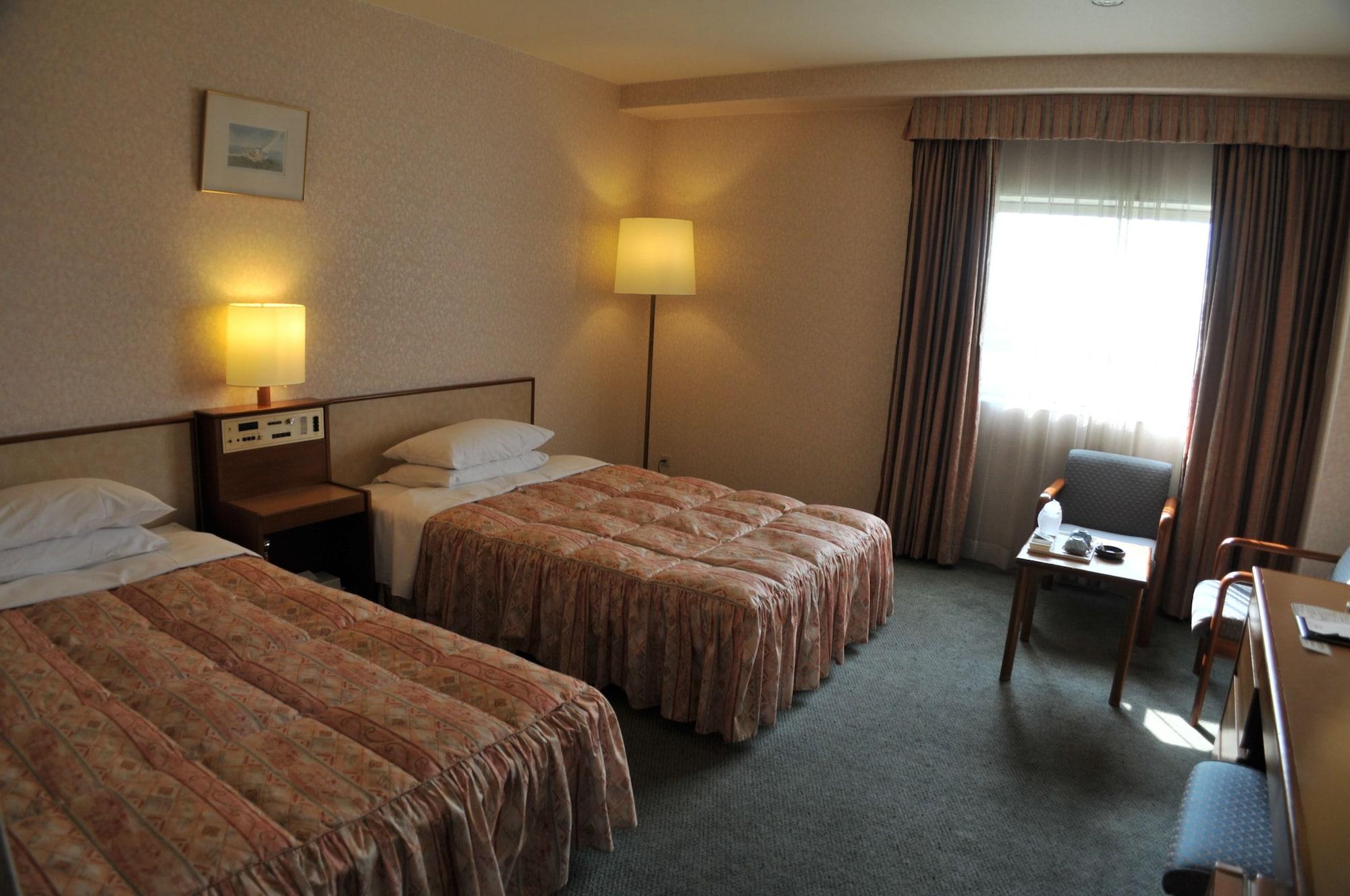 Habitación Hotel Tsu Center Palace