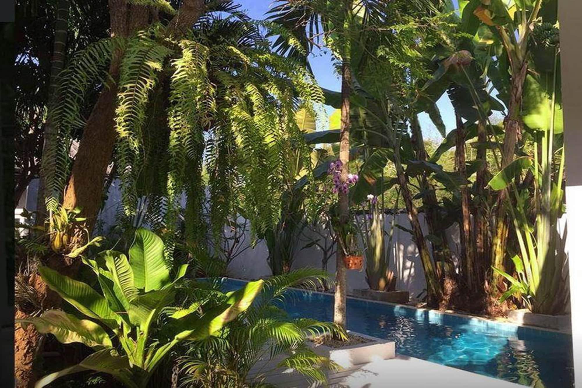 Vista Piscina Franjipani Home