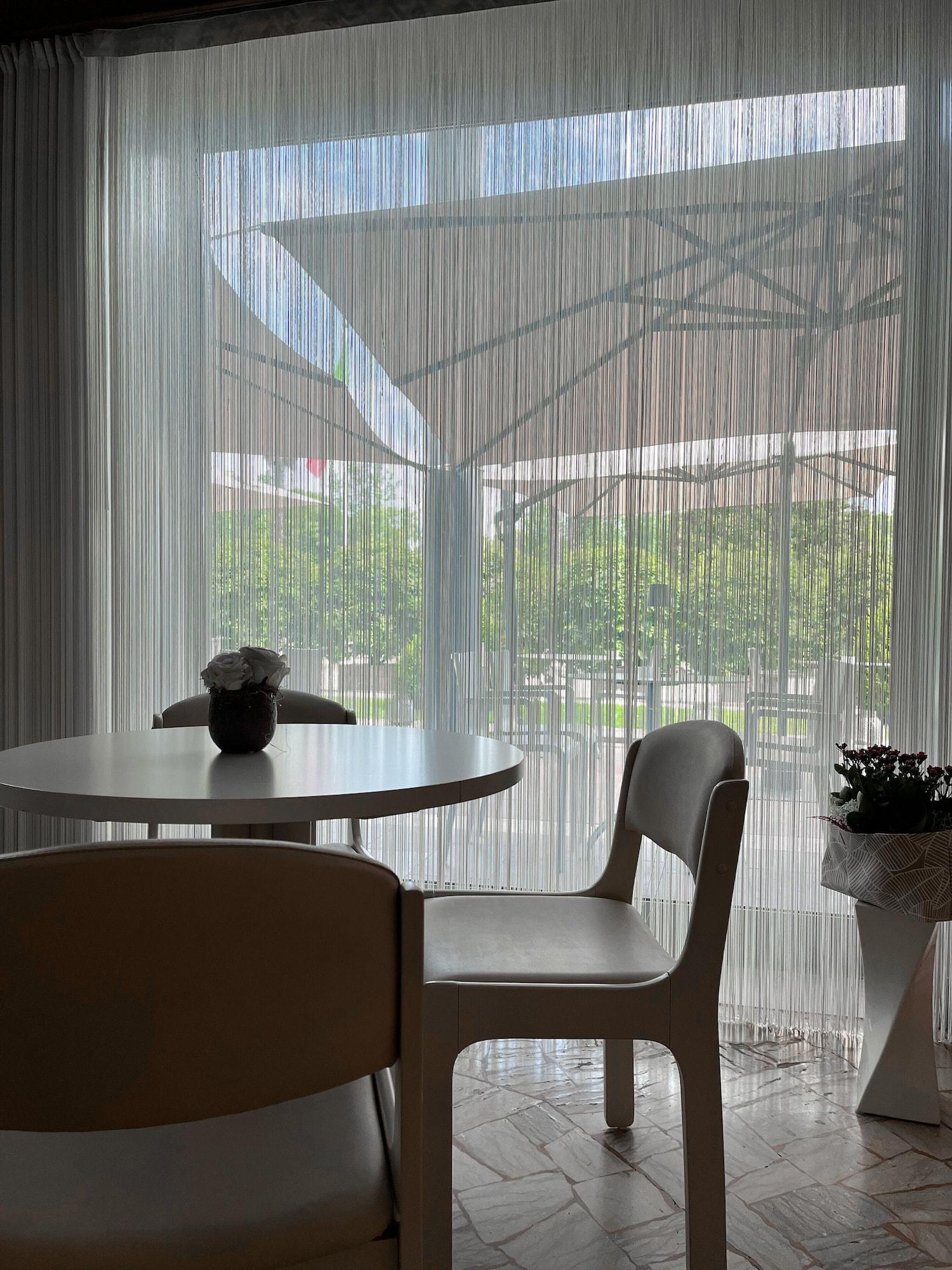 Bar/Salón Hotel Poppi