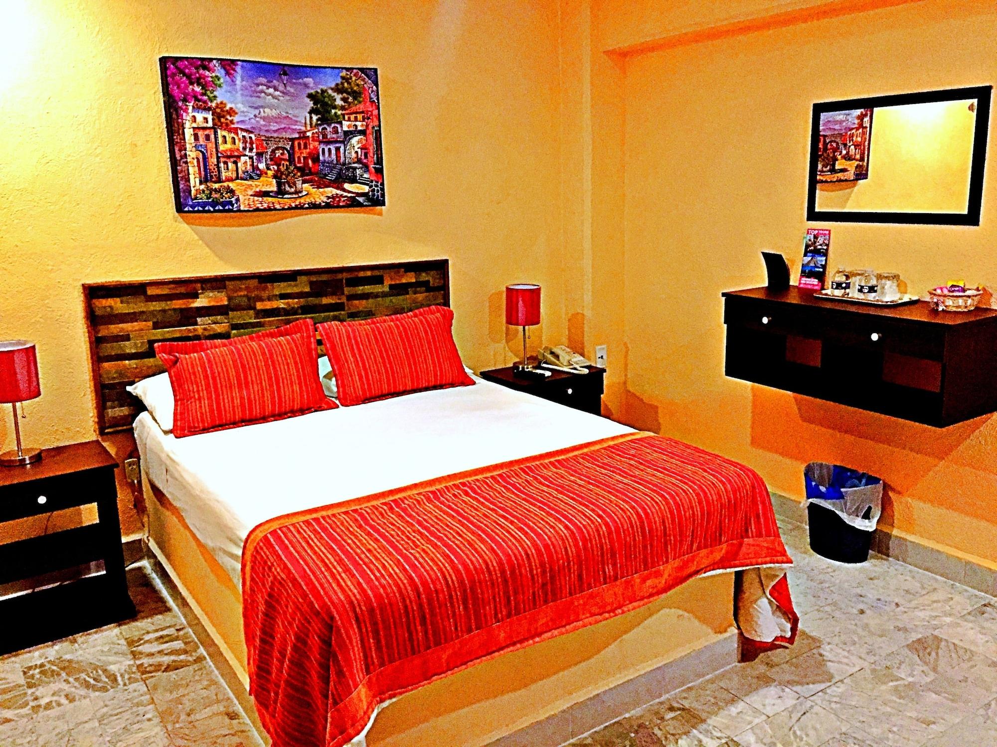 Habitación Hotel Versalles Suites