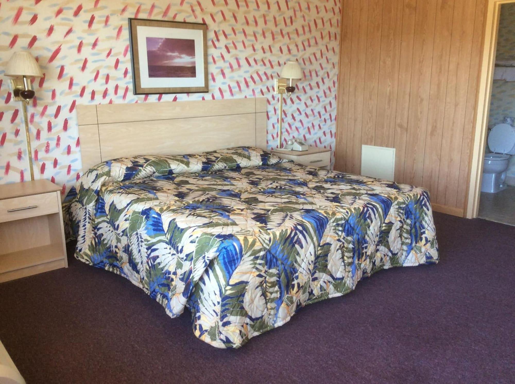 Habitación MacThrift Motor Inn
