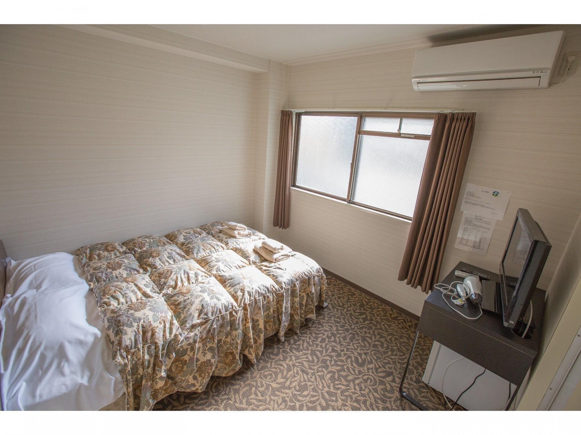 Habitación Doushin Business Inn