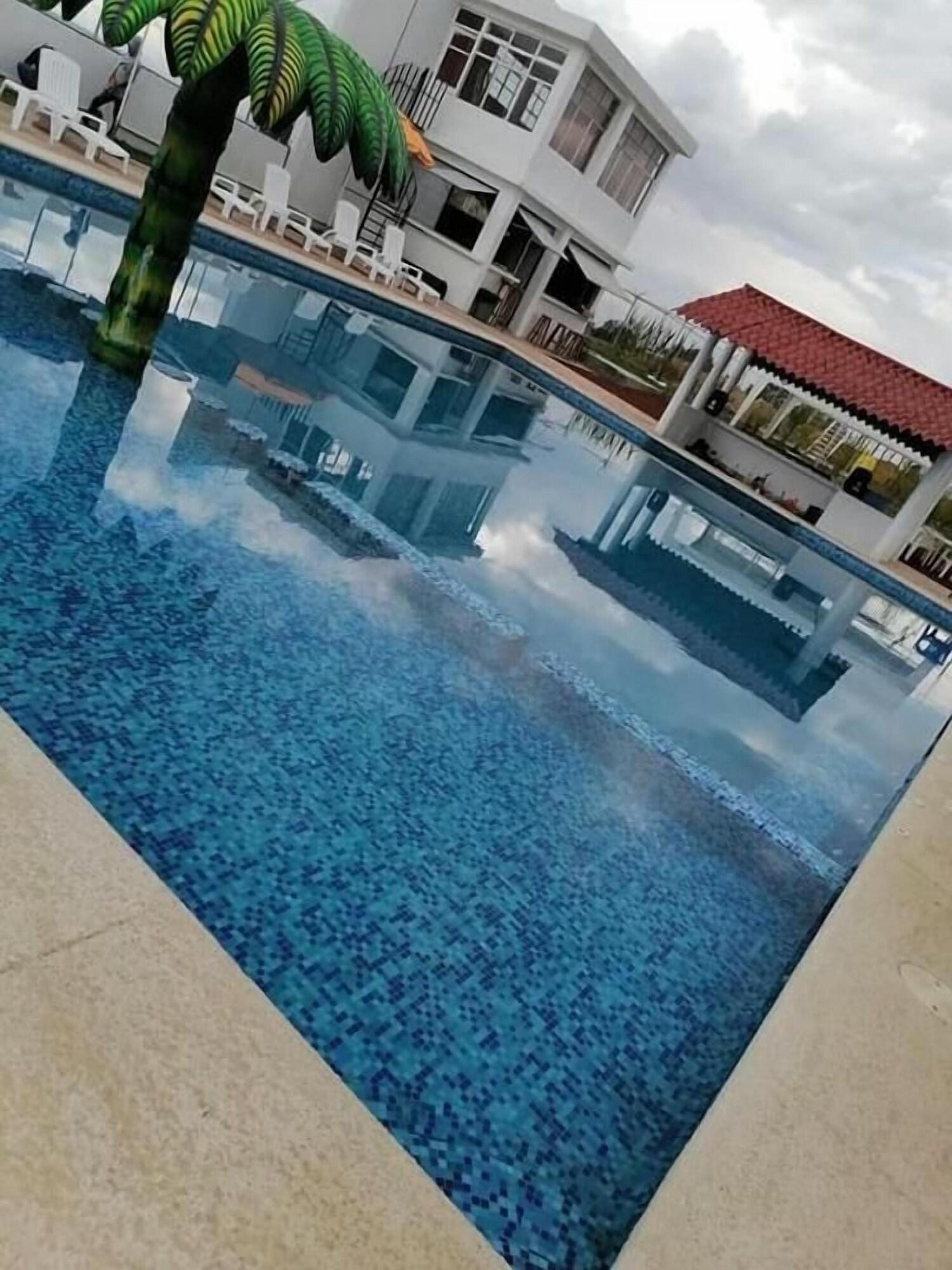 Vista Piscina Hotel & Cabañas Malinche
