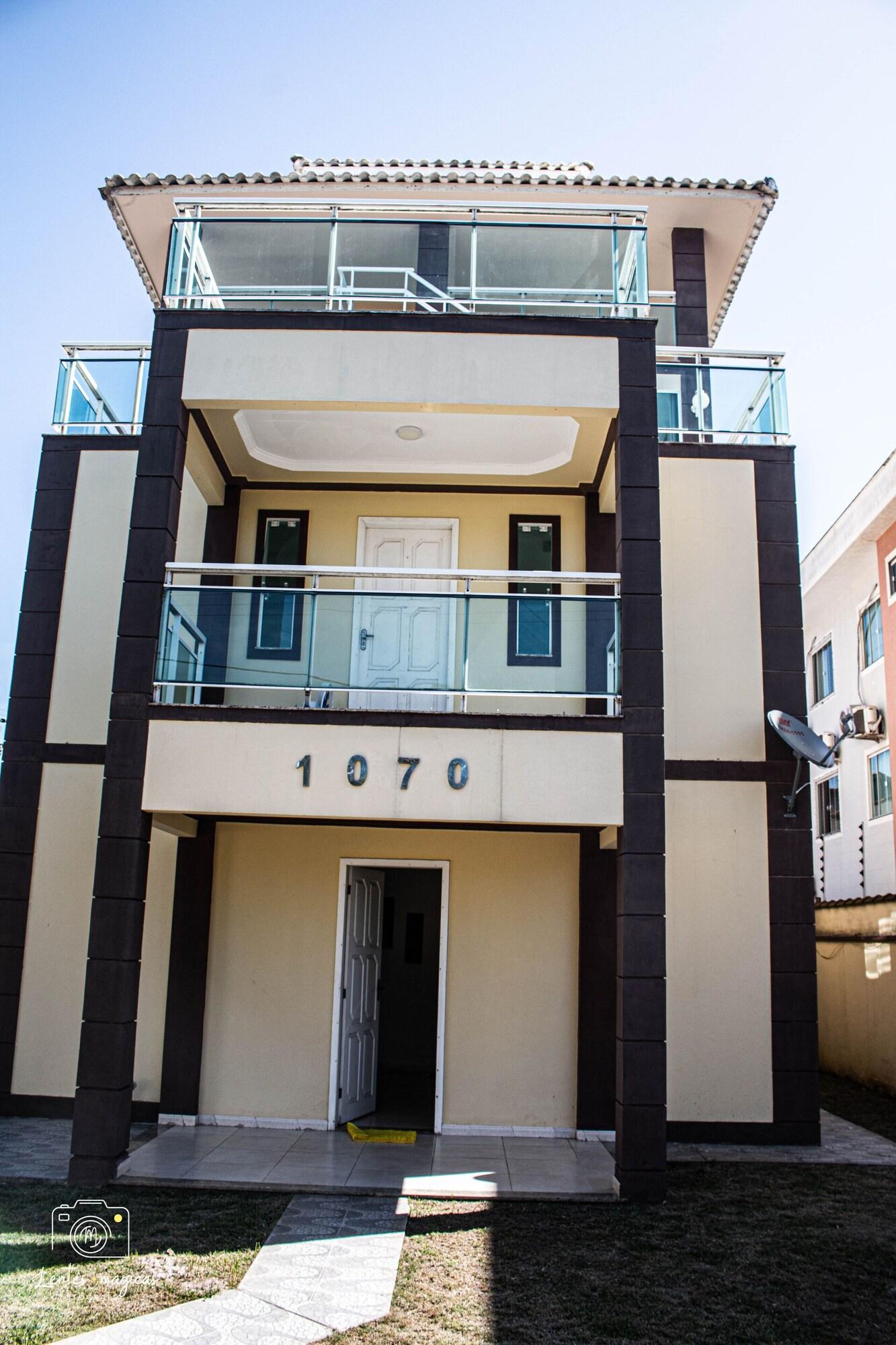 Vista Exterior pousada pe na  areia